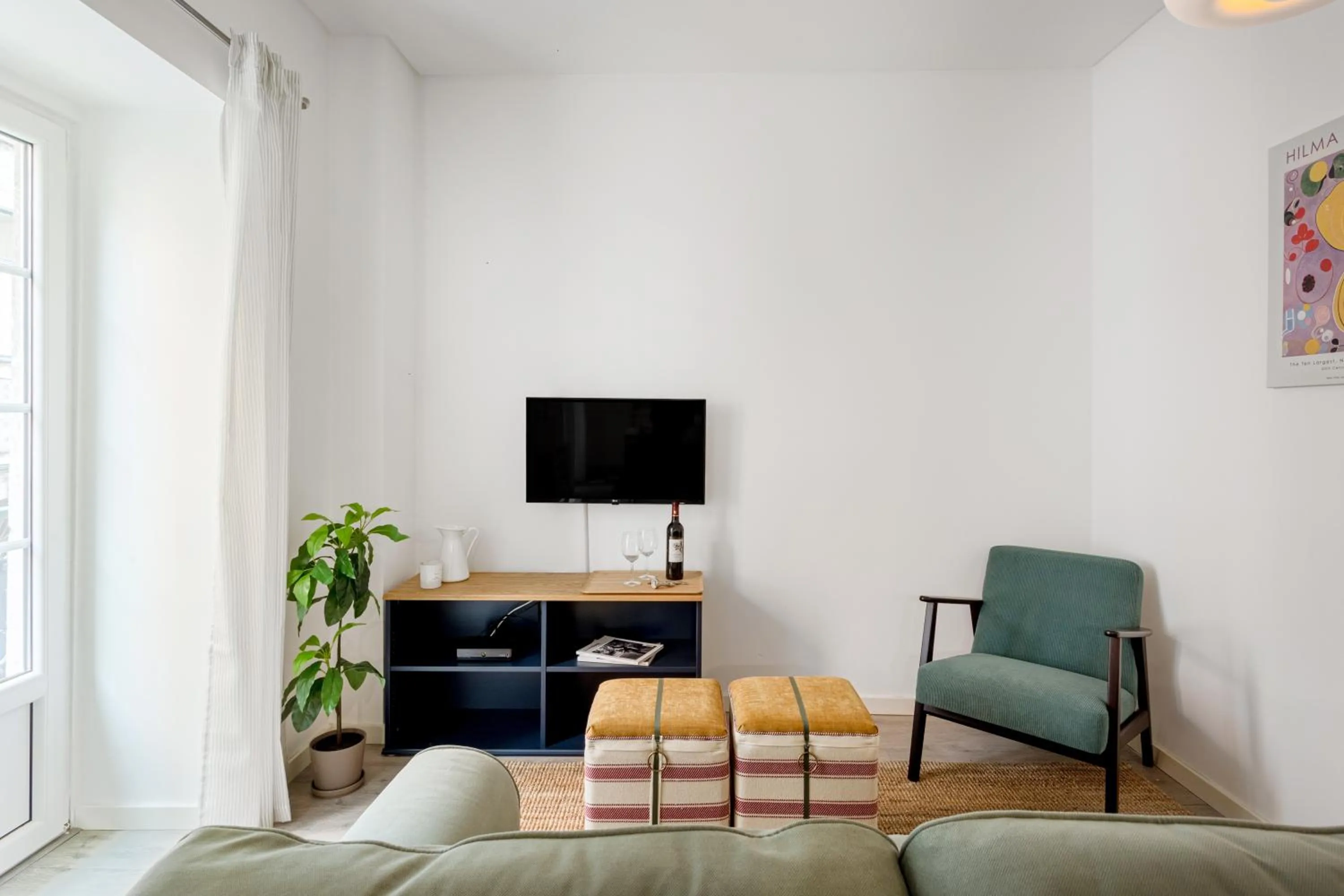 TV and multimedia in Atalaia Prime Apartments at Bairro Alto