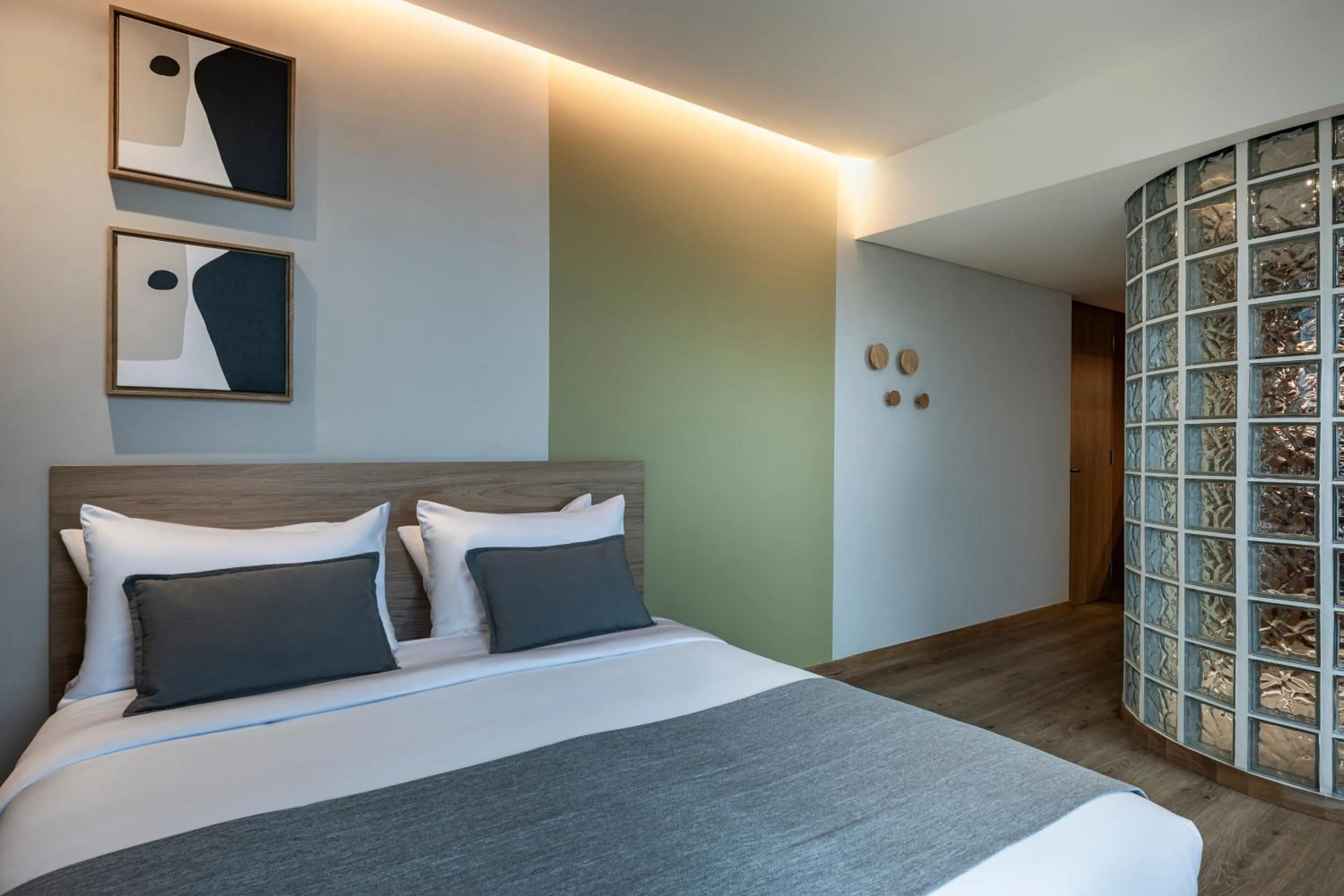 Bed in Heiss Hotel By Jalo