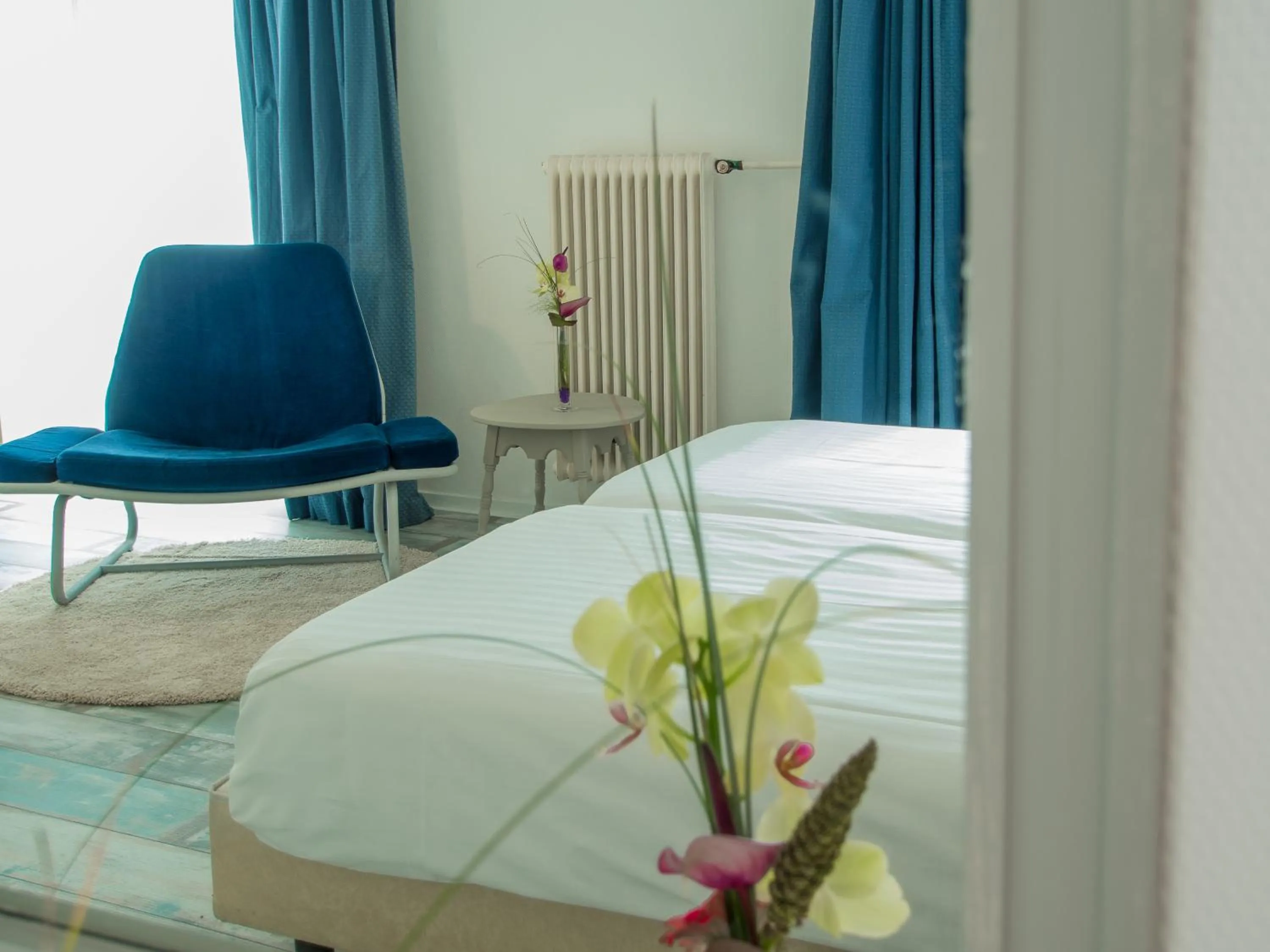 Seating area, Bed in Stadshotel de Graafschap