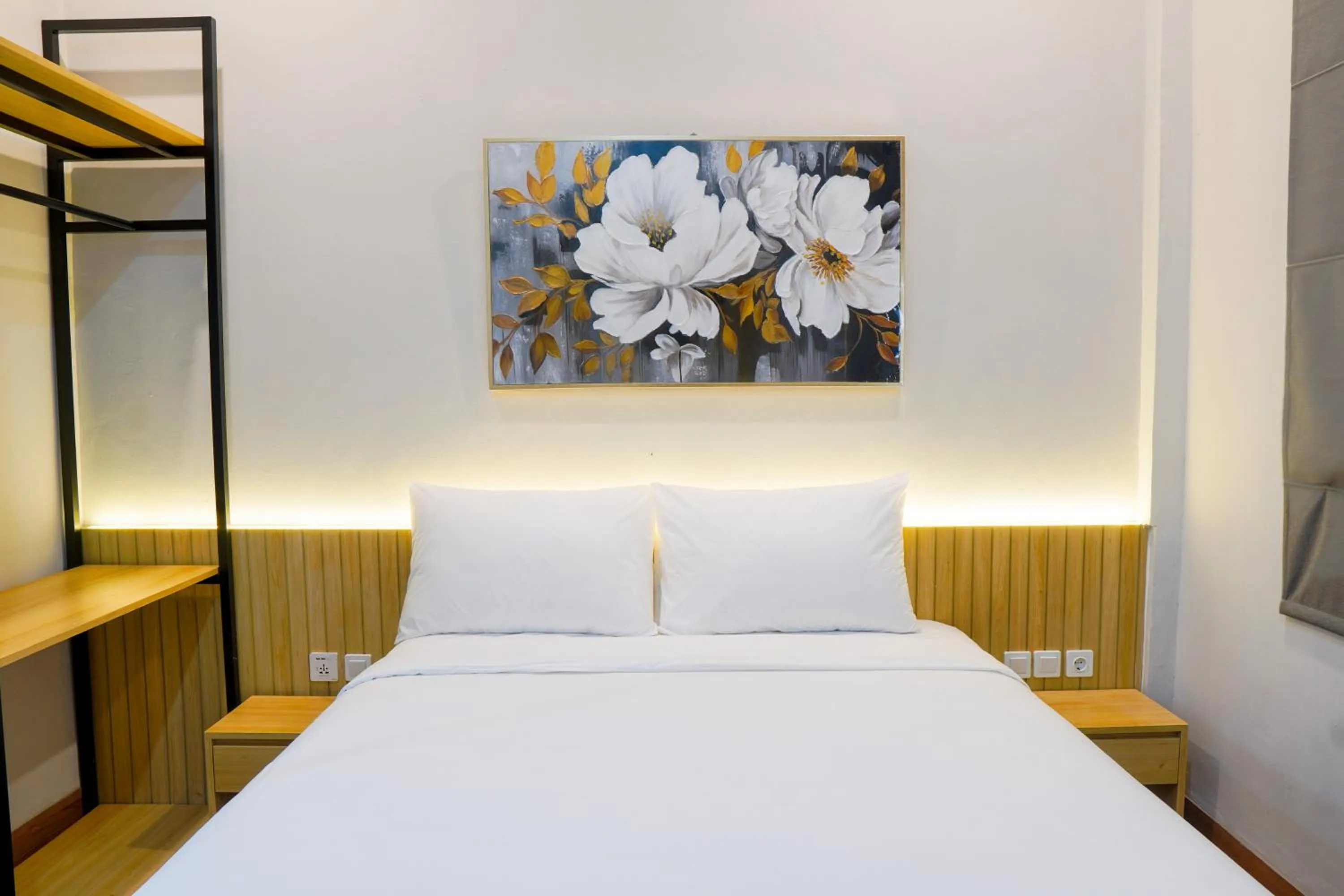 Bed in Ardiana Suite Hotel By Sajiwa