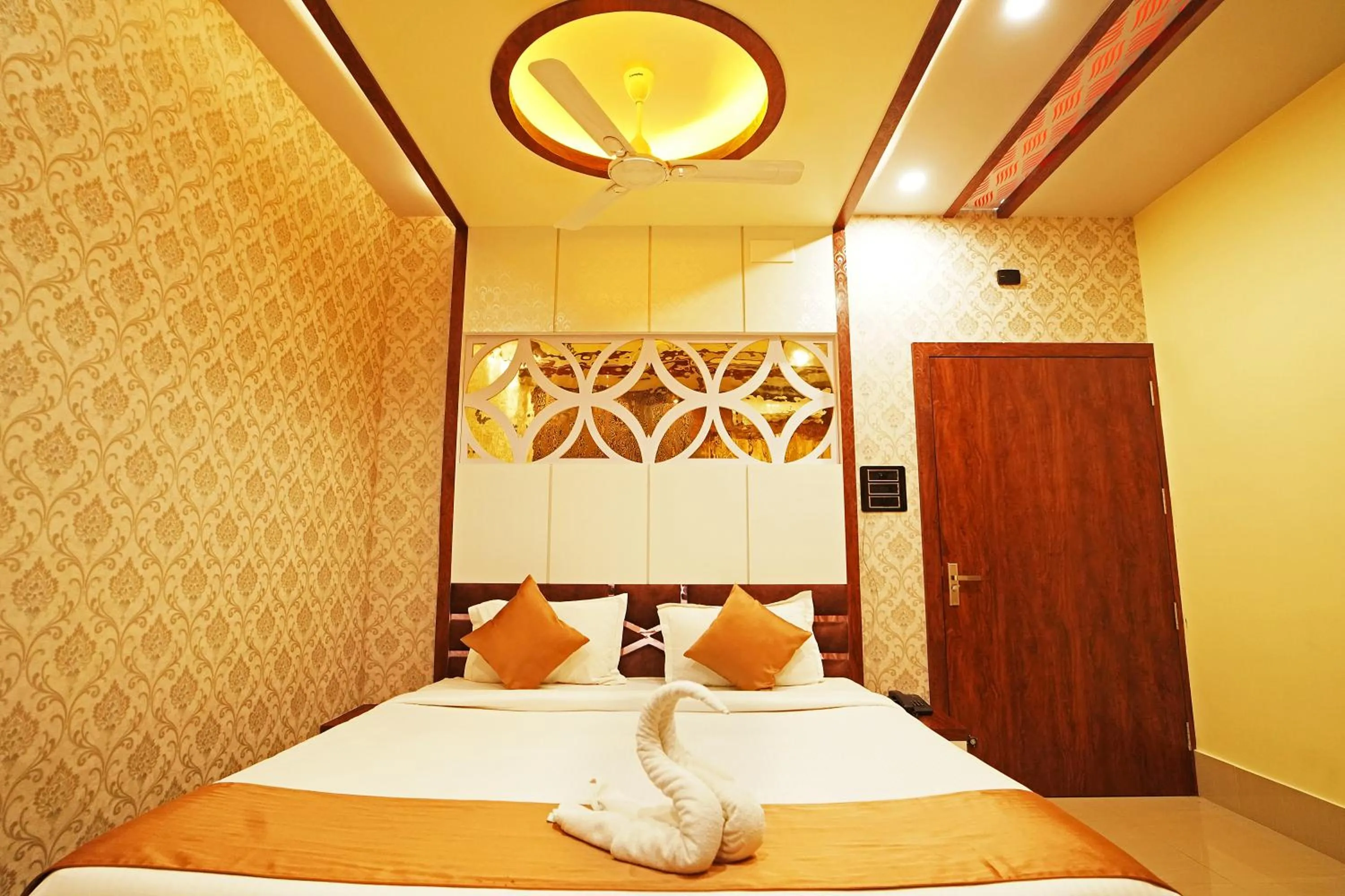 Bed in PS Luxury Hotel
