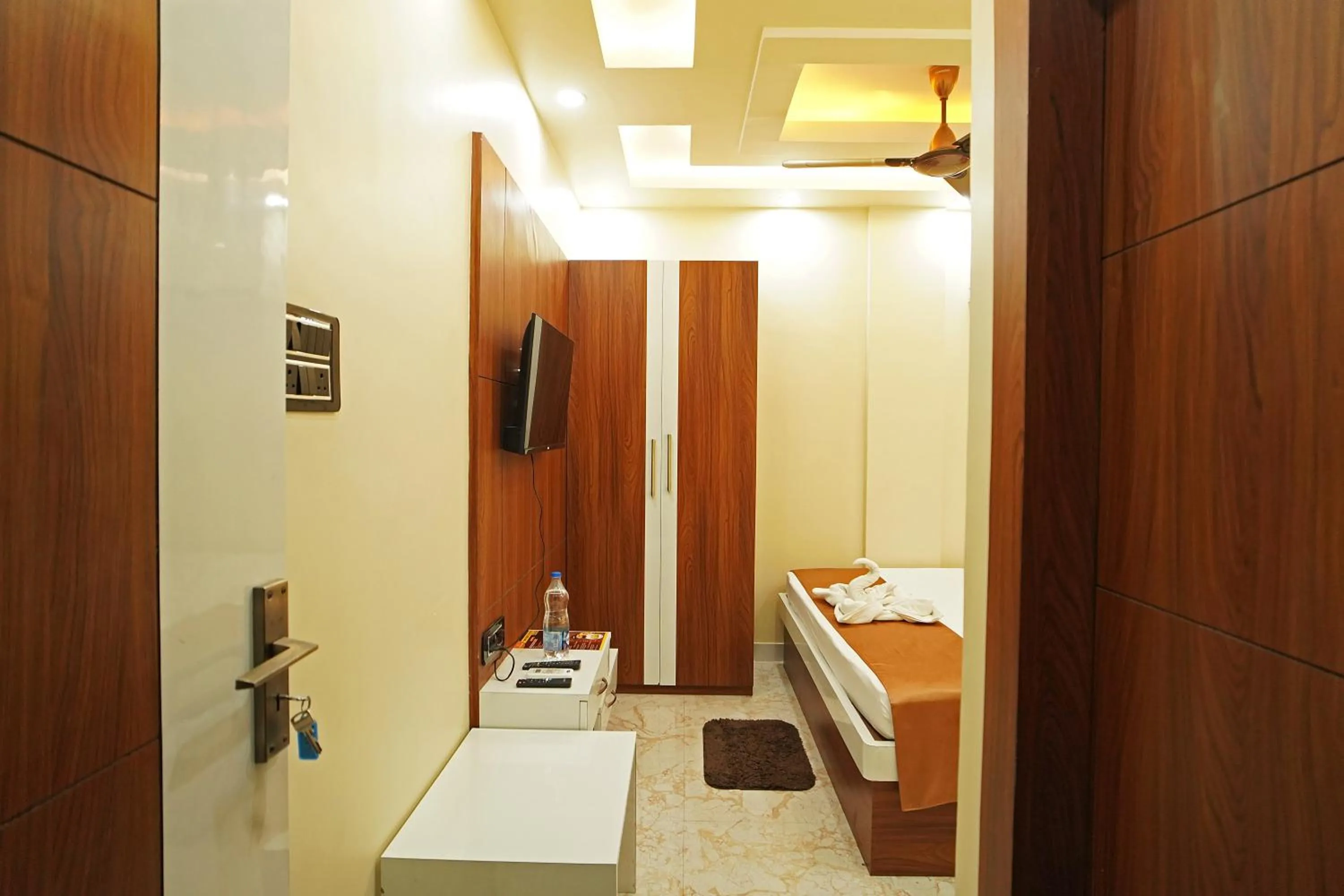 Bed in PS Luxury Hotel