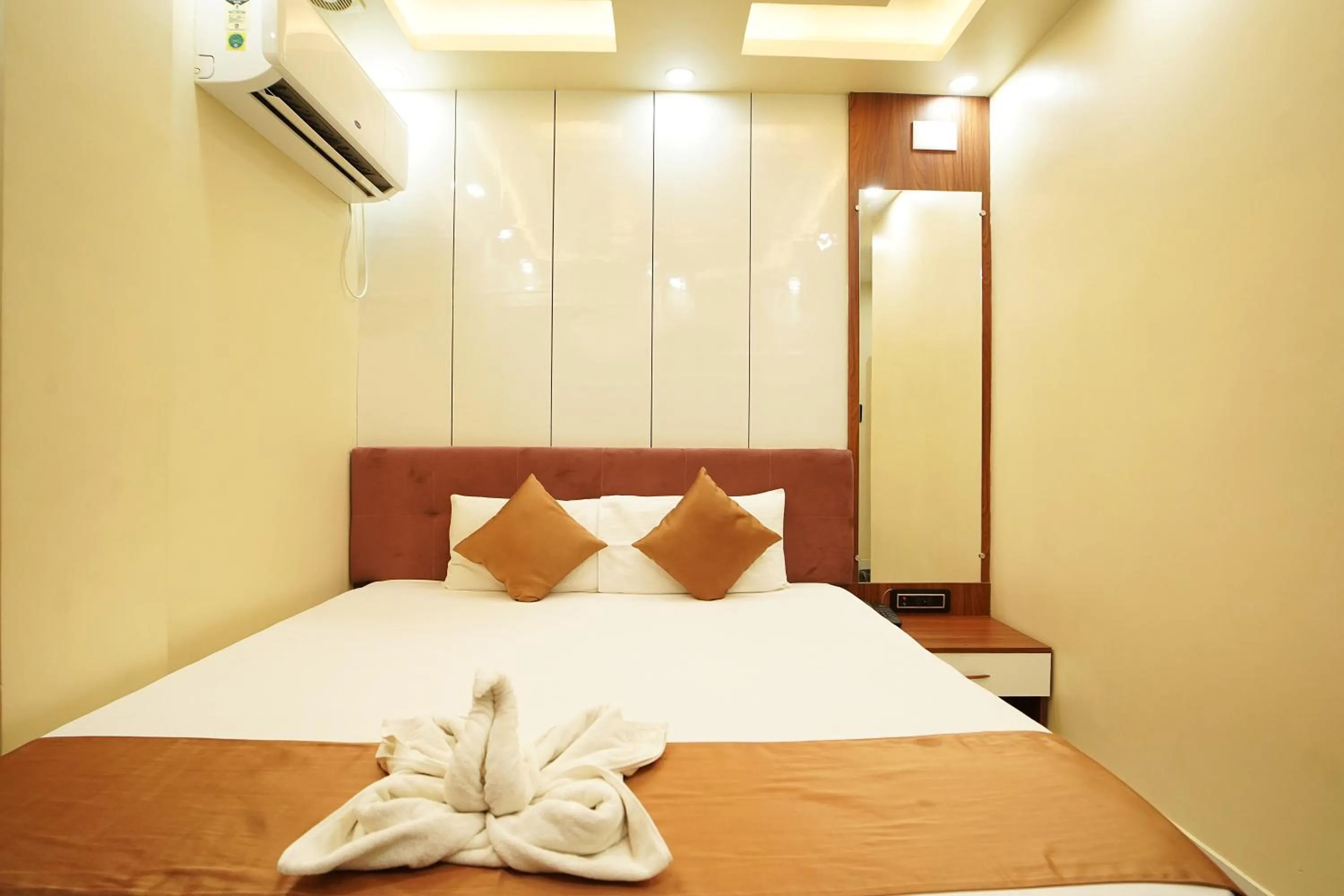 Bed in PS Luxury Hotel