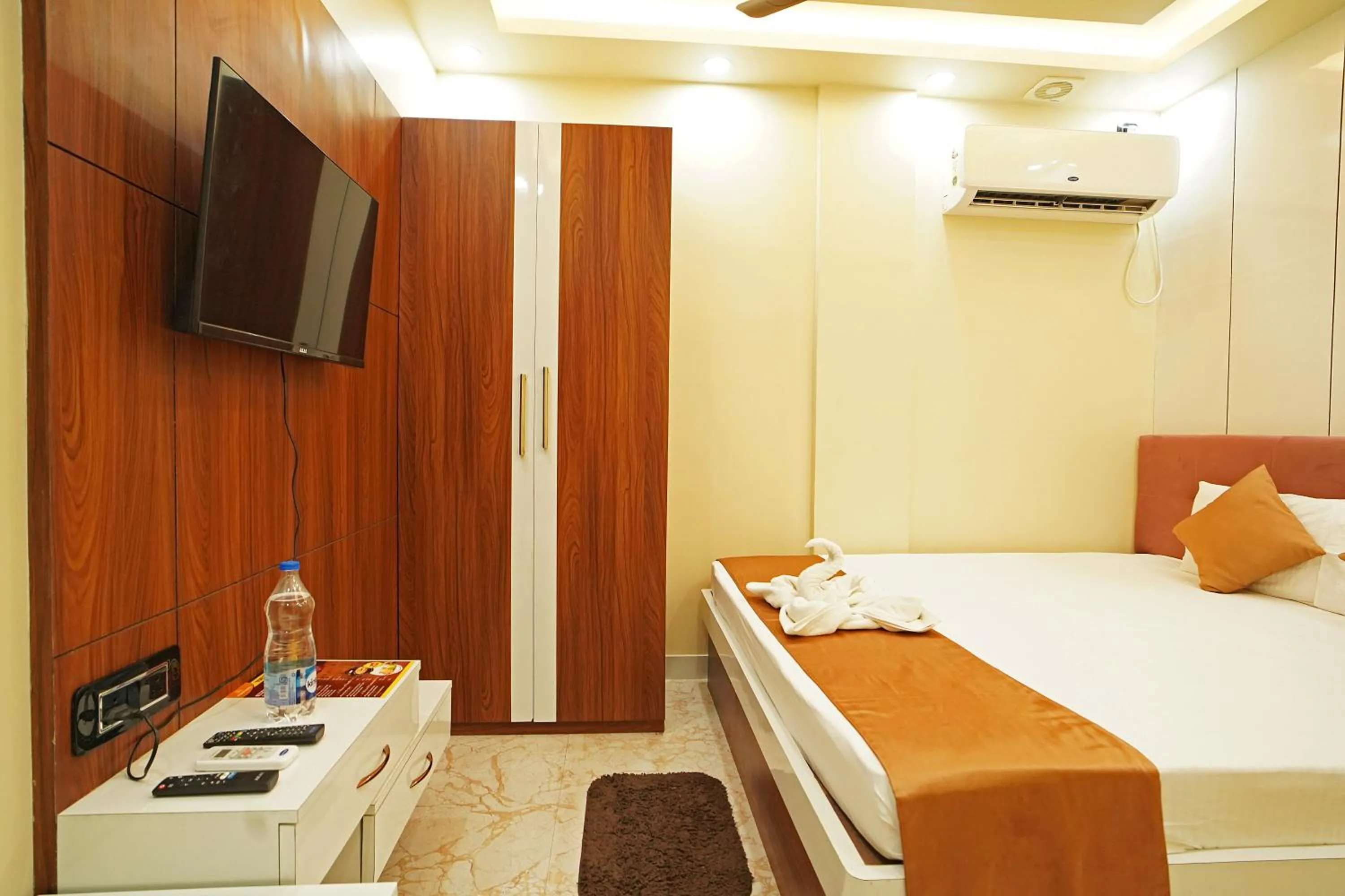Bed in PS Luxury Hotel