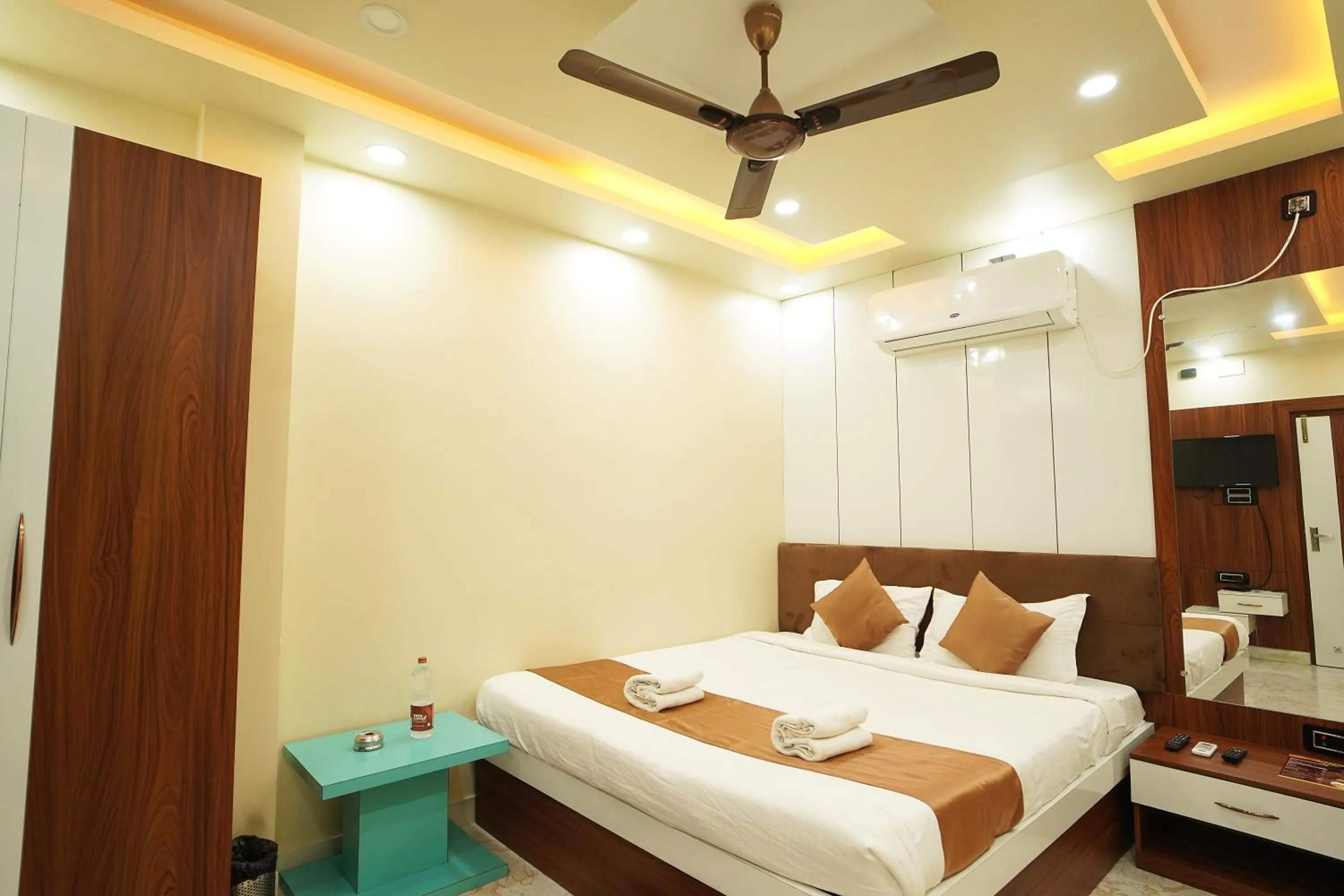 Bed in PS Luxury Hotel