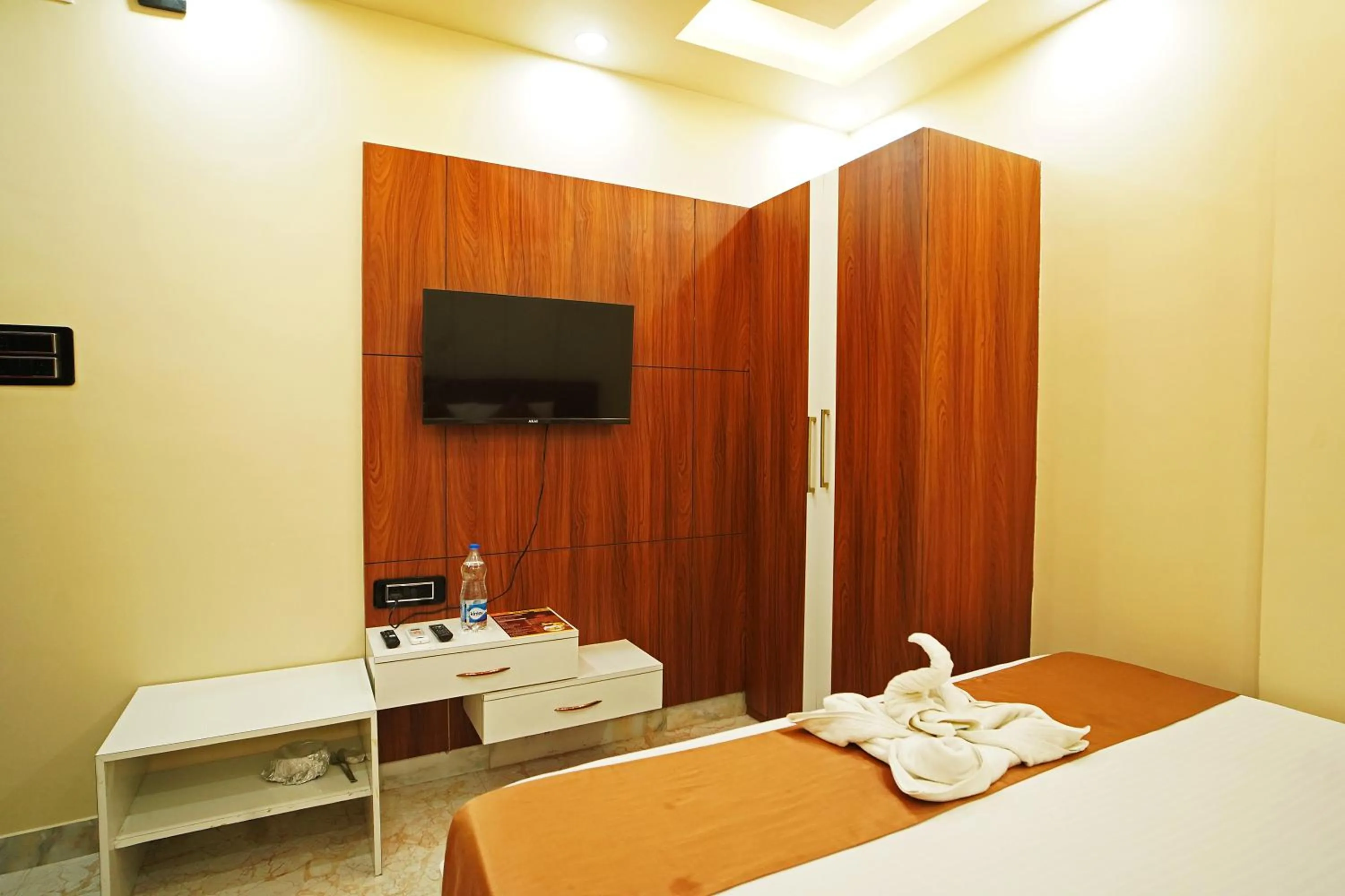 Bed in PS Luxury Hotel