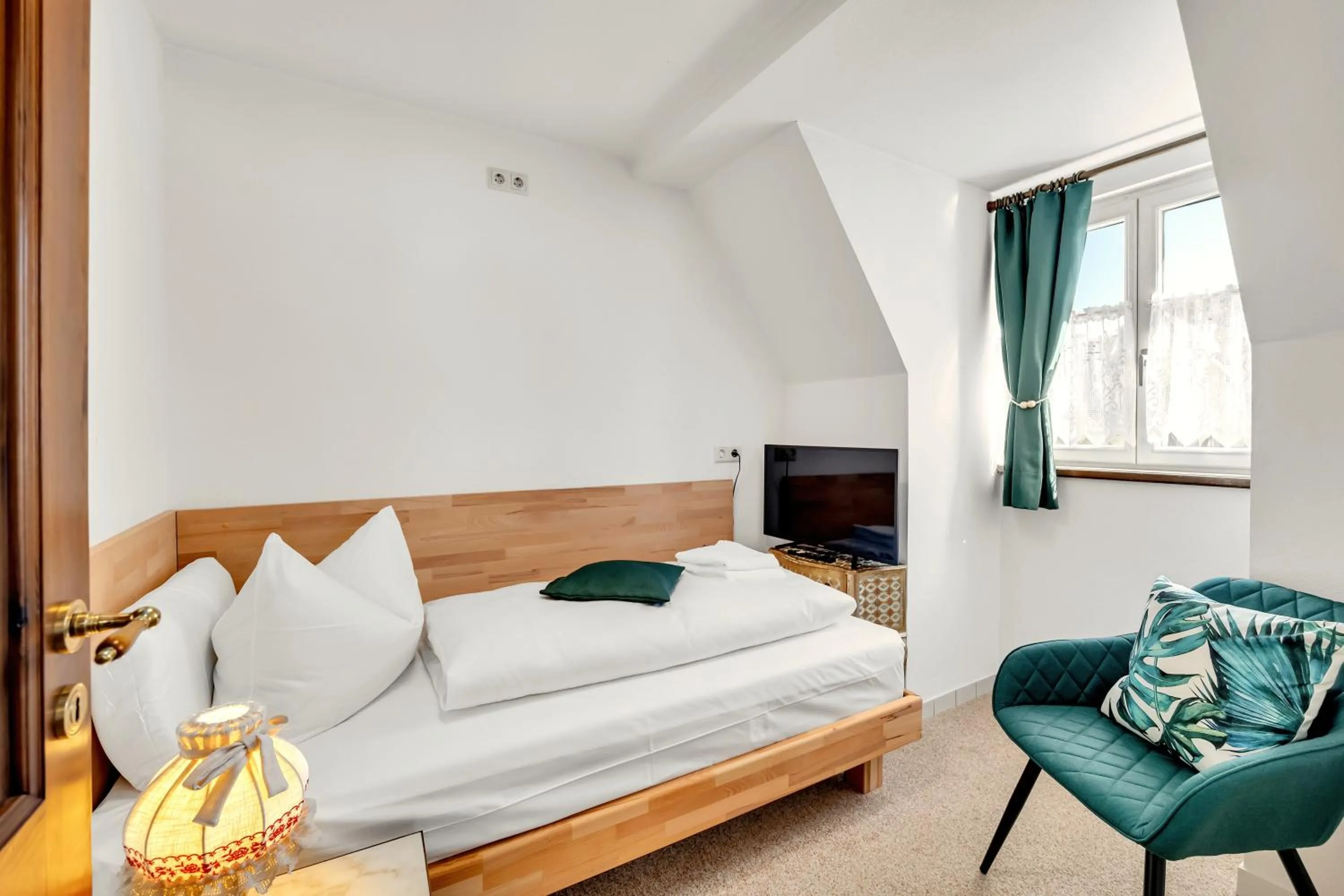 Bed in Artistique Hotel