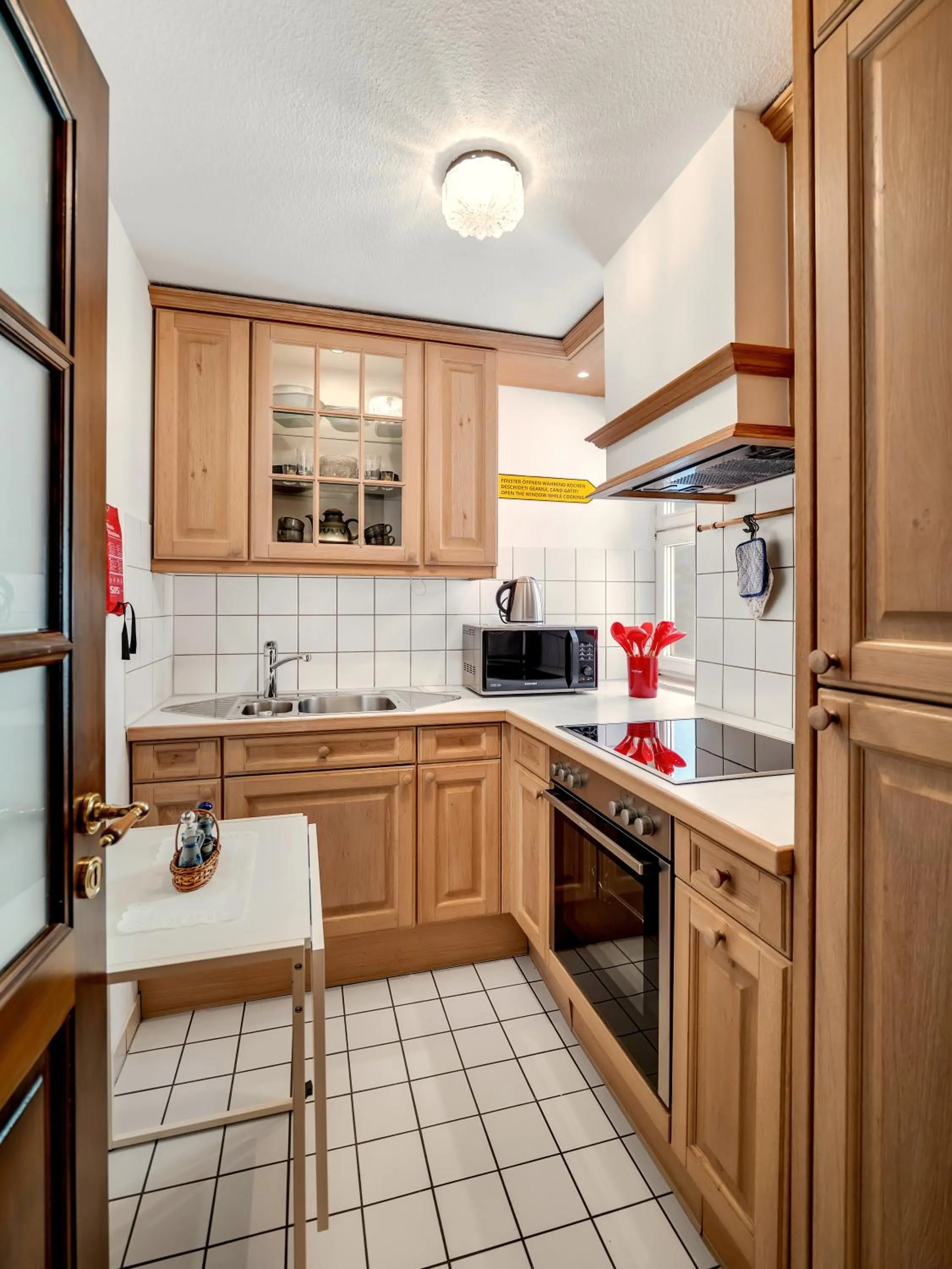 Kitchen or kitchenette in Artistique Hotel