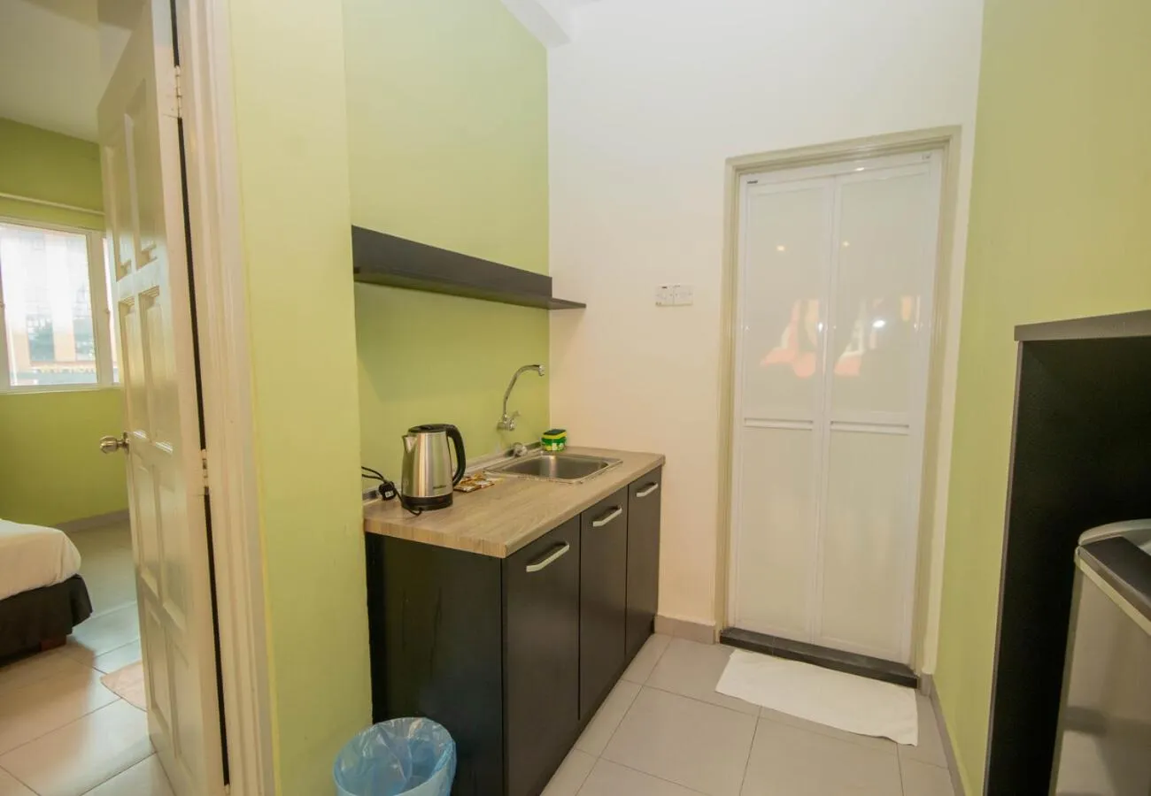 Kitchen or kitchenette in JQ Osborne Apartment