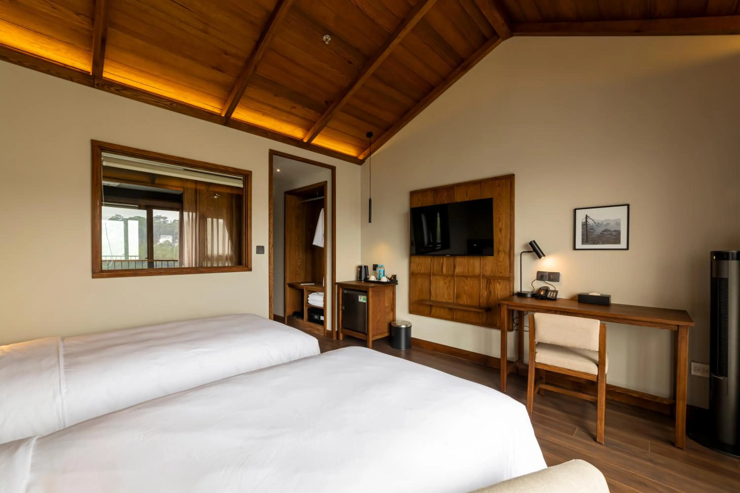 Communal lounge/ TV room, Bed in HLS Dalat Lodge