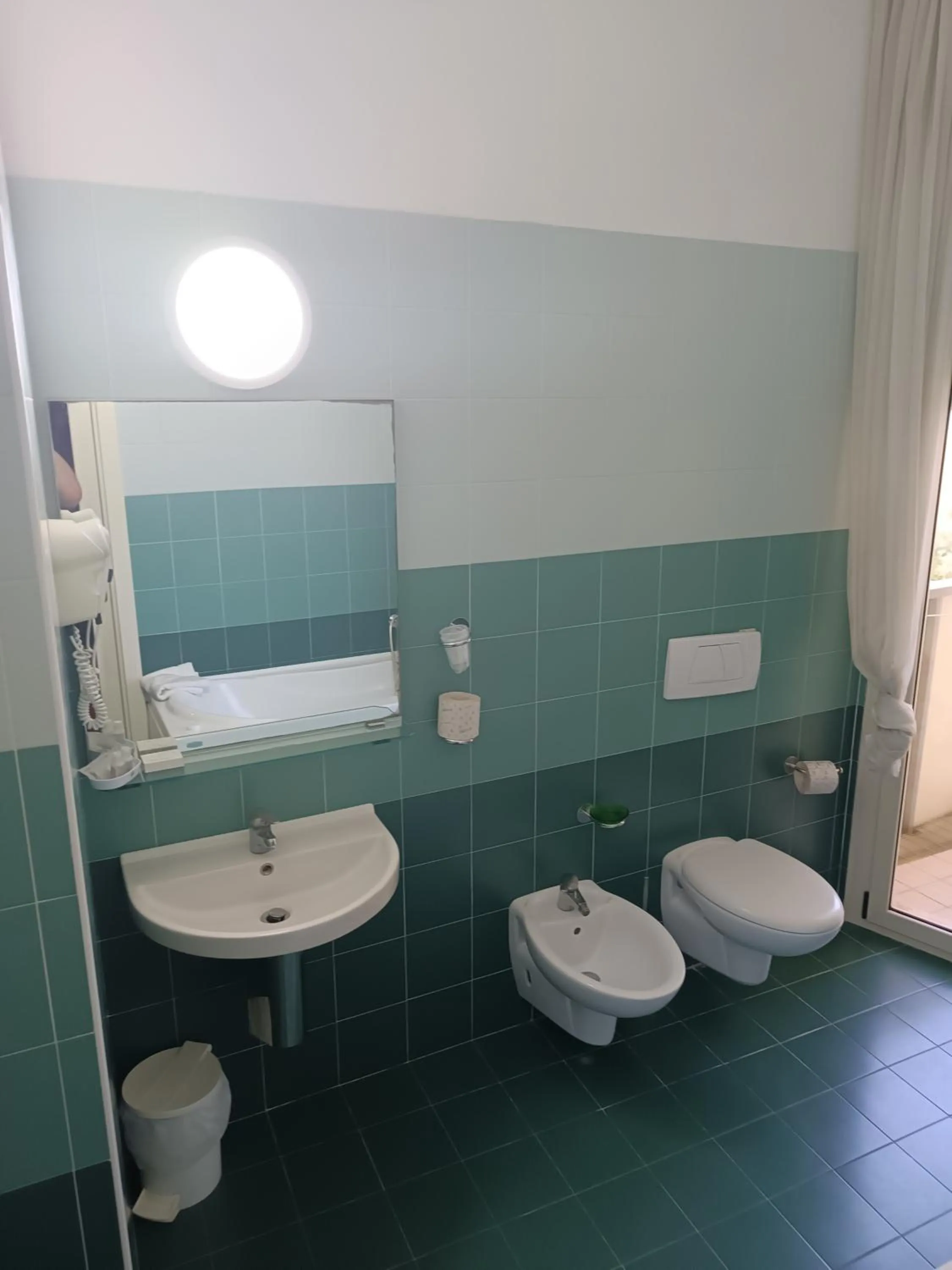 Bathroom in Hotel Remin Plaza