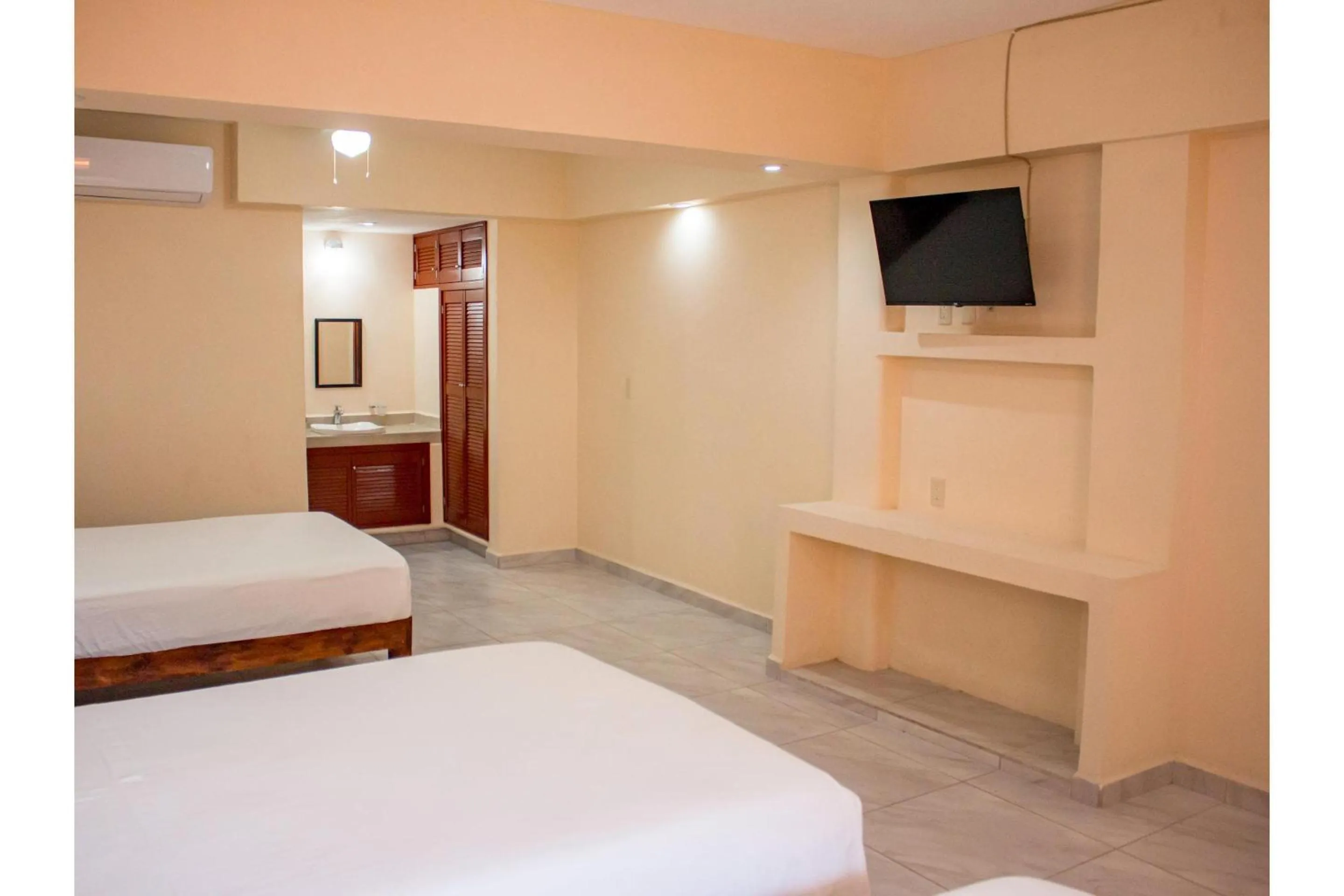 Bedroom, Bed in OYO Hotel La Playa