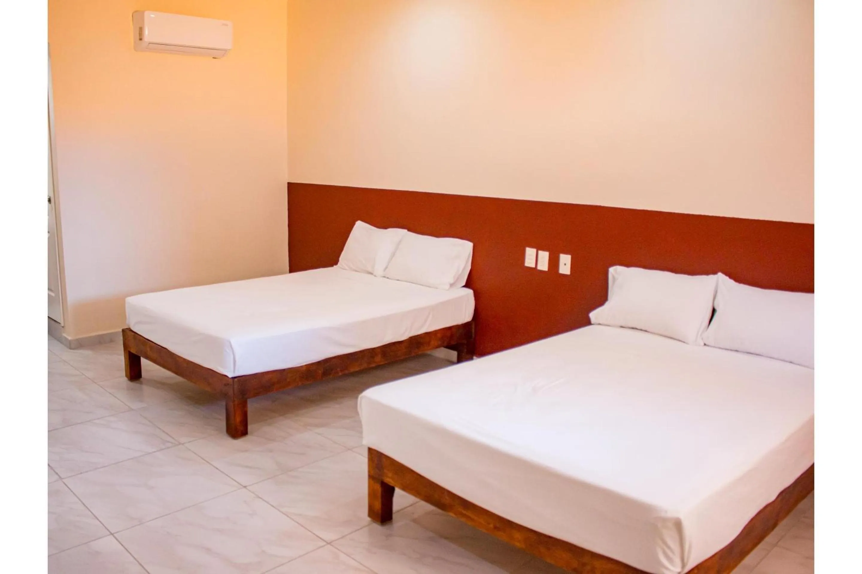 Bedroom, Bed in OYO Hotel La Playa