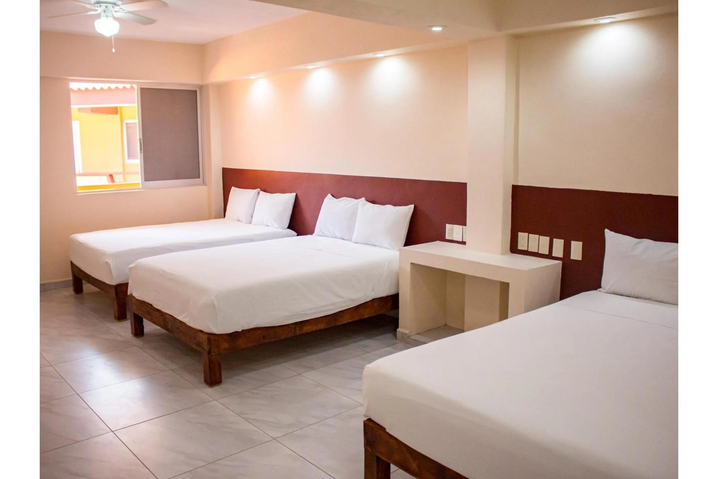 Bedroom, Bed in OYO Hotel La Playa