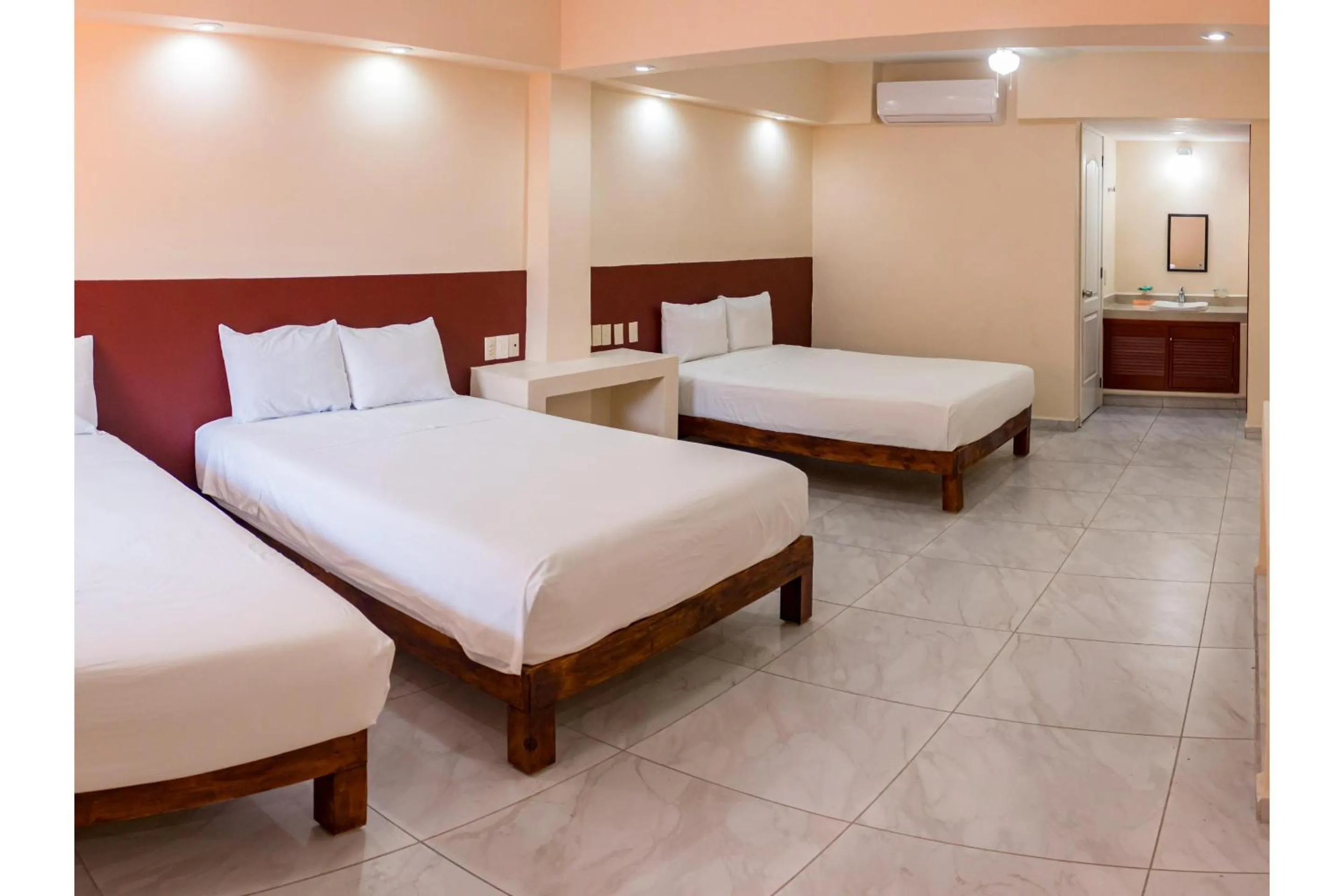 Bedroom, Bed in OYO Hotel La Playa