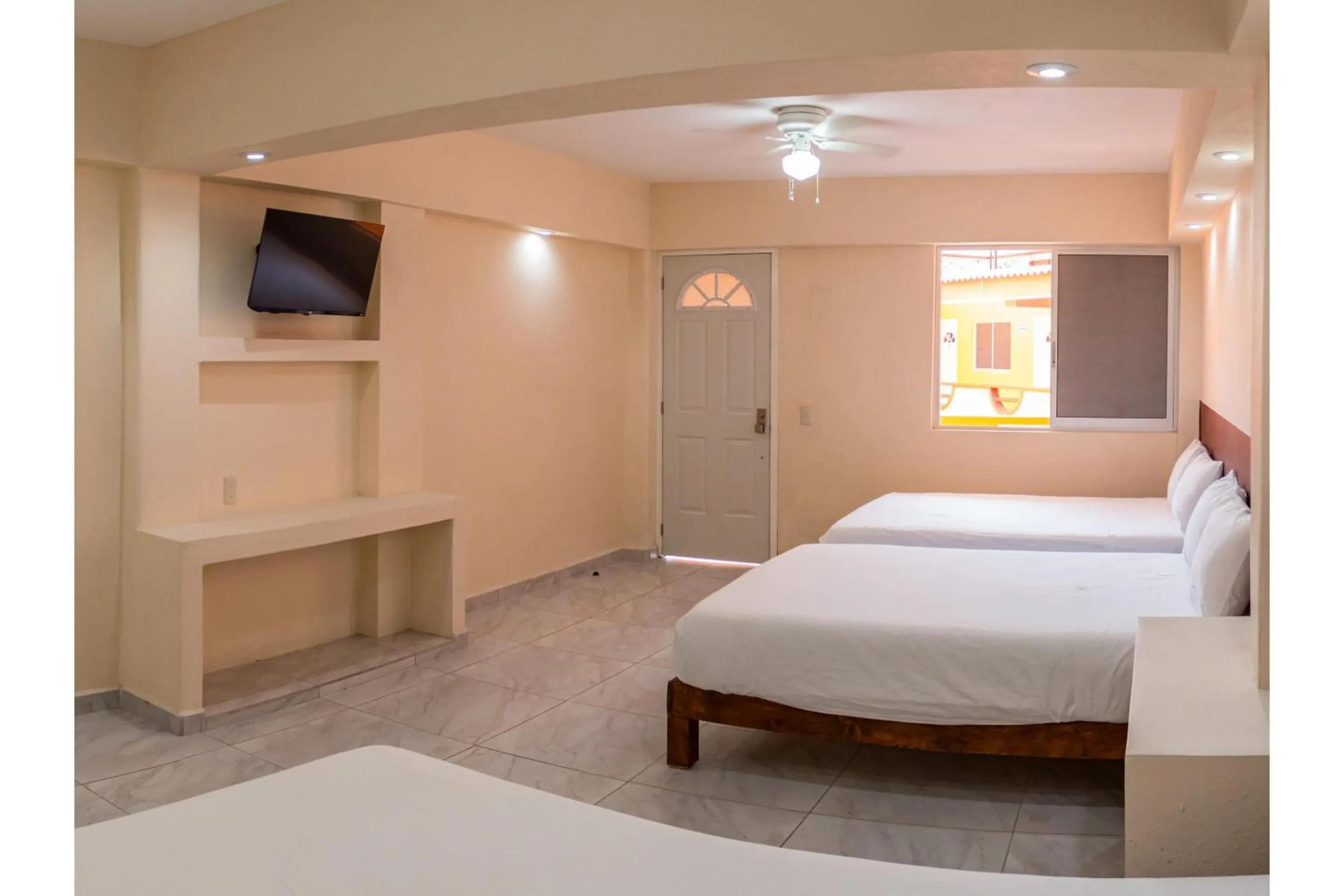 Bedroom, Bed in OYO Hotel La Playa