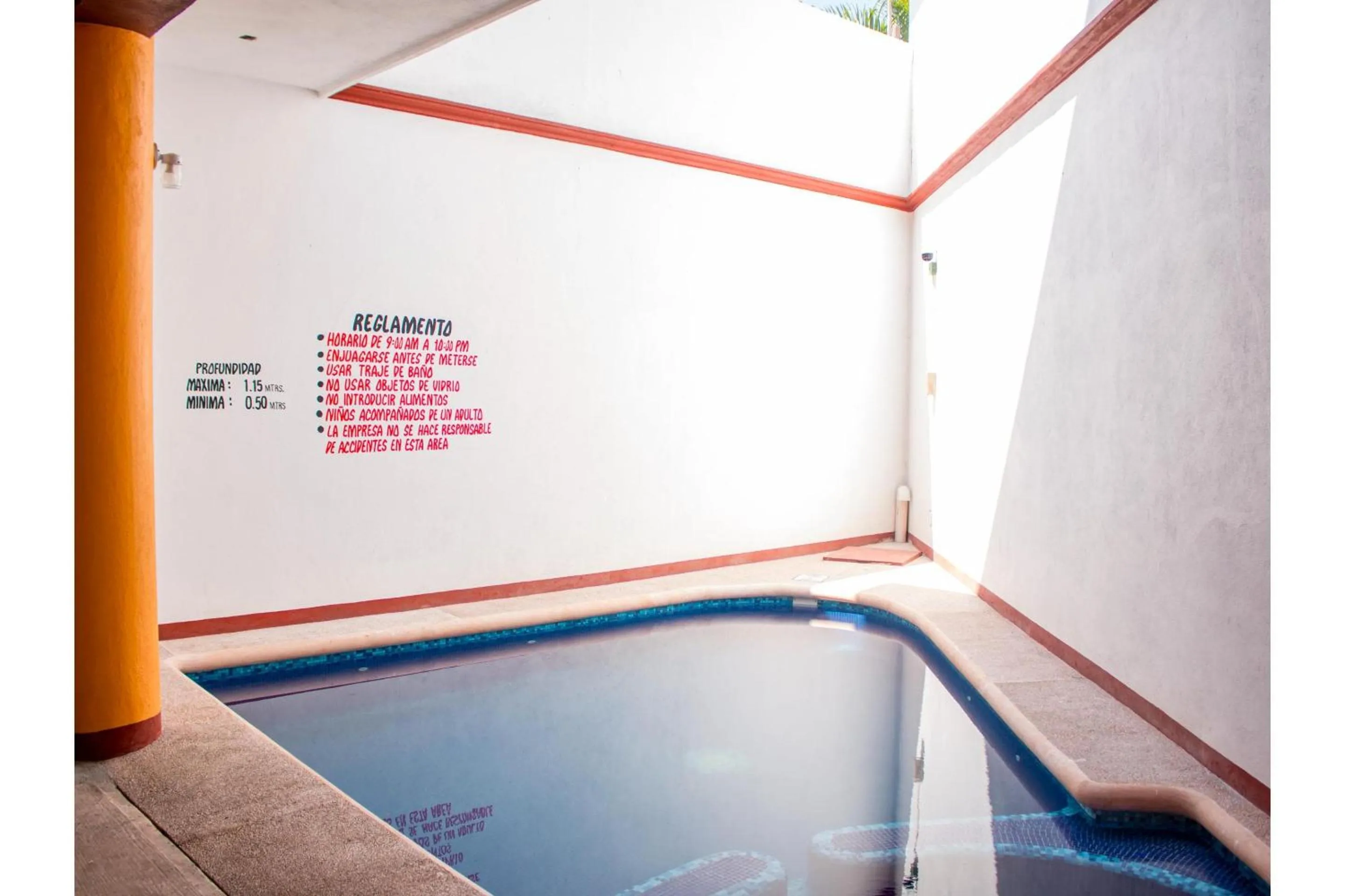 Swimming pool in OYO Hotel La Playa