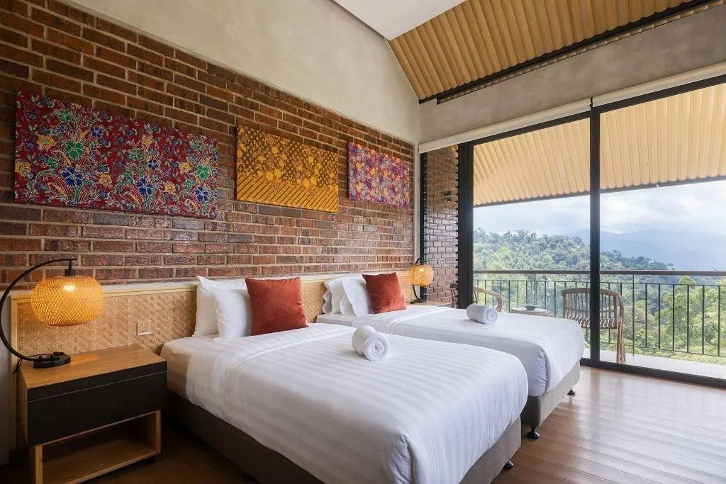 Bed in Vanavasa Resort