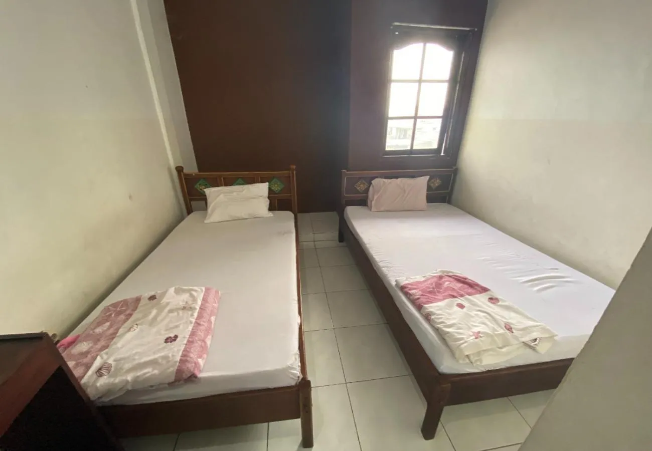 Bed in Hotel Candra Adigraha