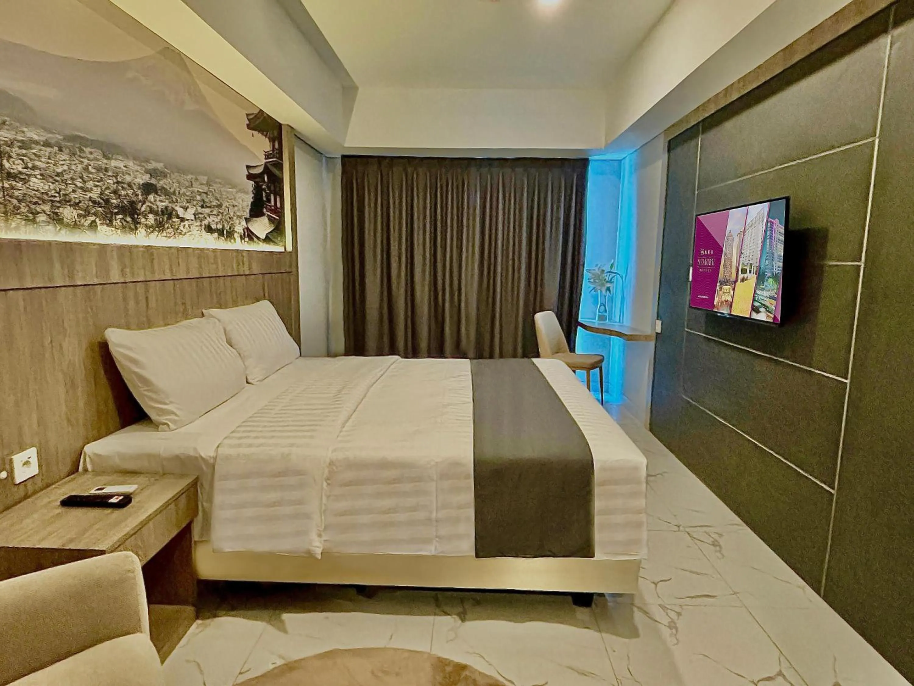 Bed in Nemuru Grand Suites