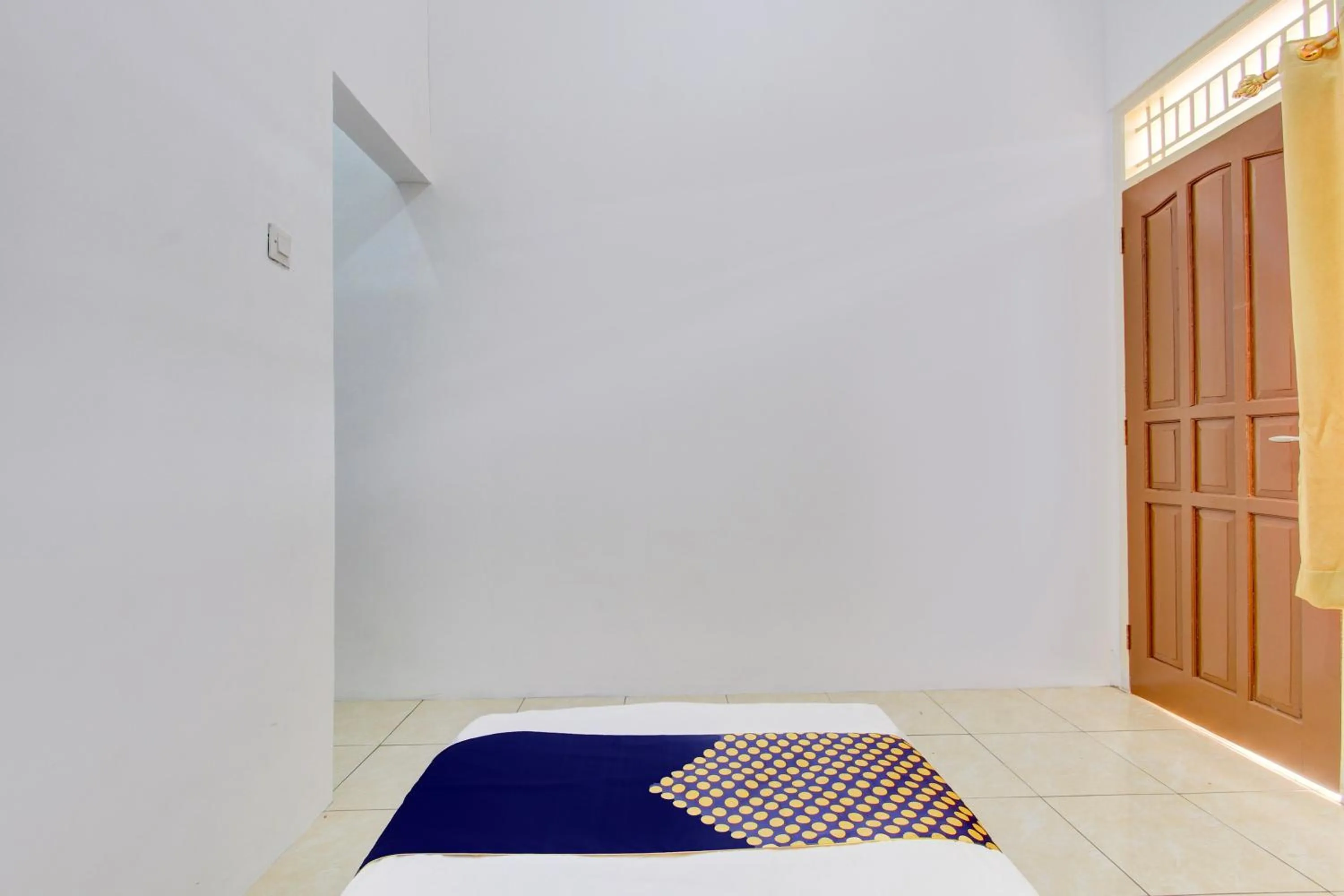 Bedroom in Hotel O Guest House Wijaya Syariah Near alun alun kota purwokerto