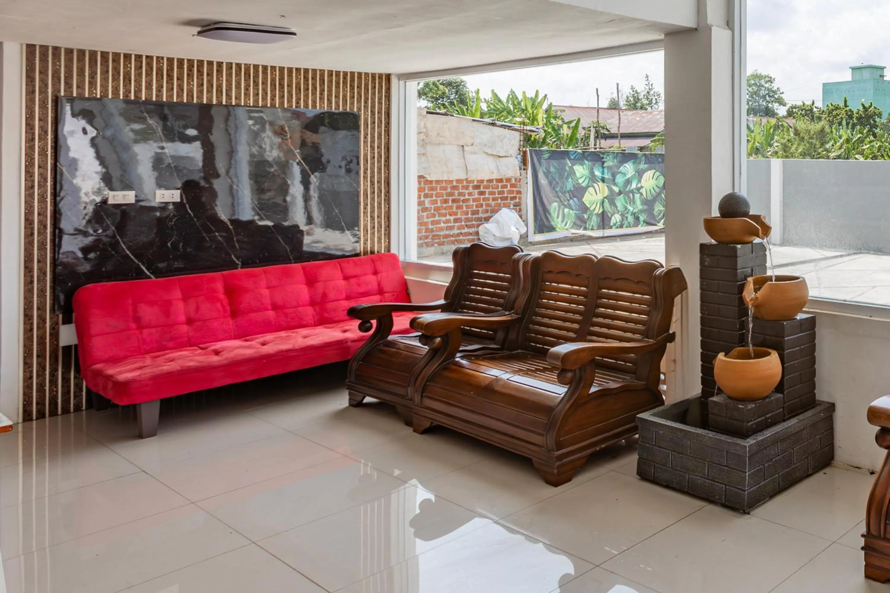 Lobby or reception in Hotel O Guest House Maria