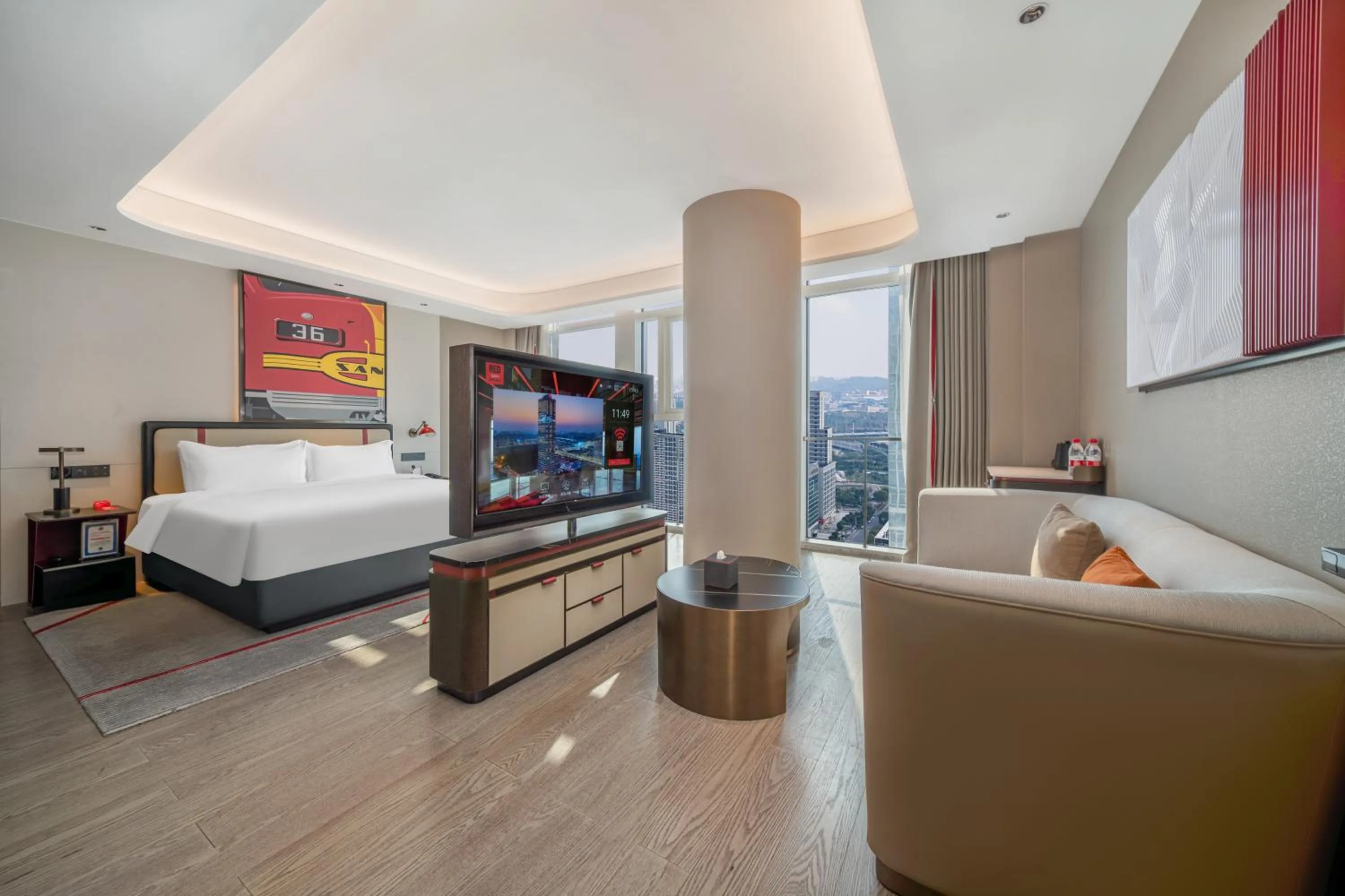 Living room, Bed in Radisson Red Guangzhou South Railway Station