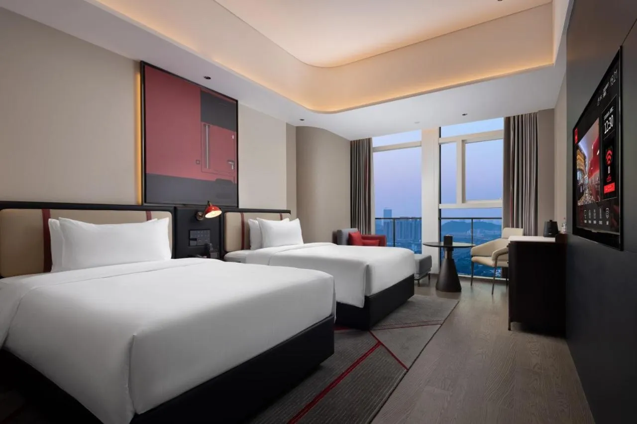 Photo of the whole room, Bed in Radisson Red Guangzhou South Railway Station