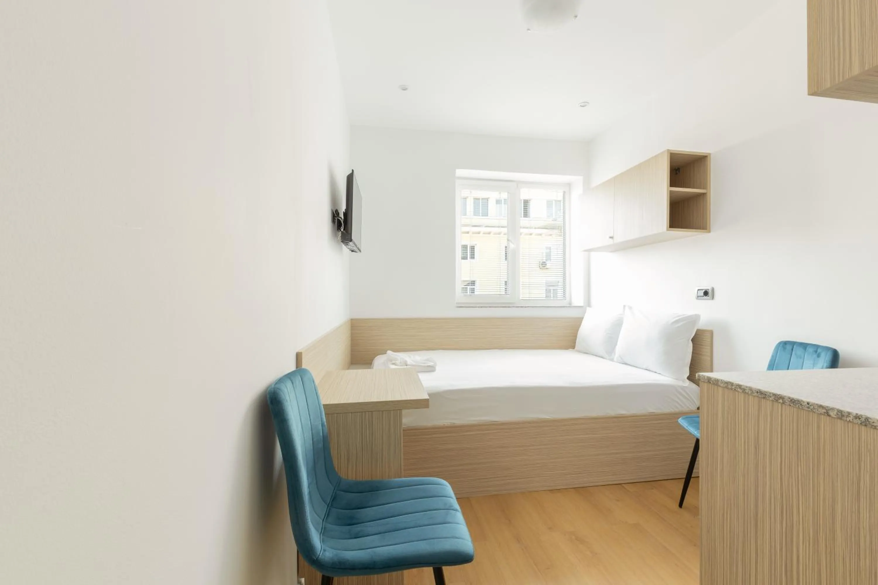 Bed in Millennia Hotel