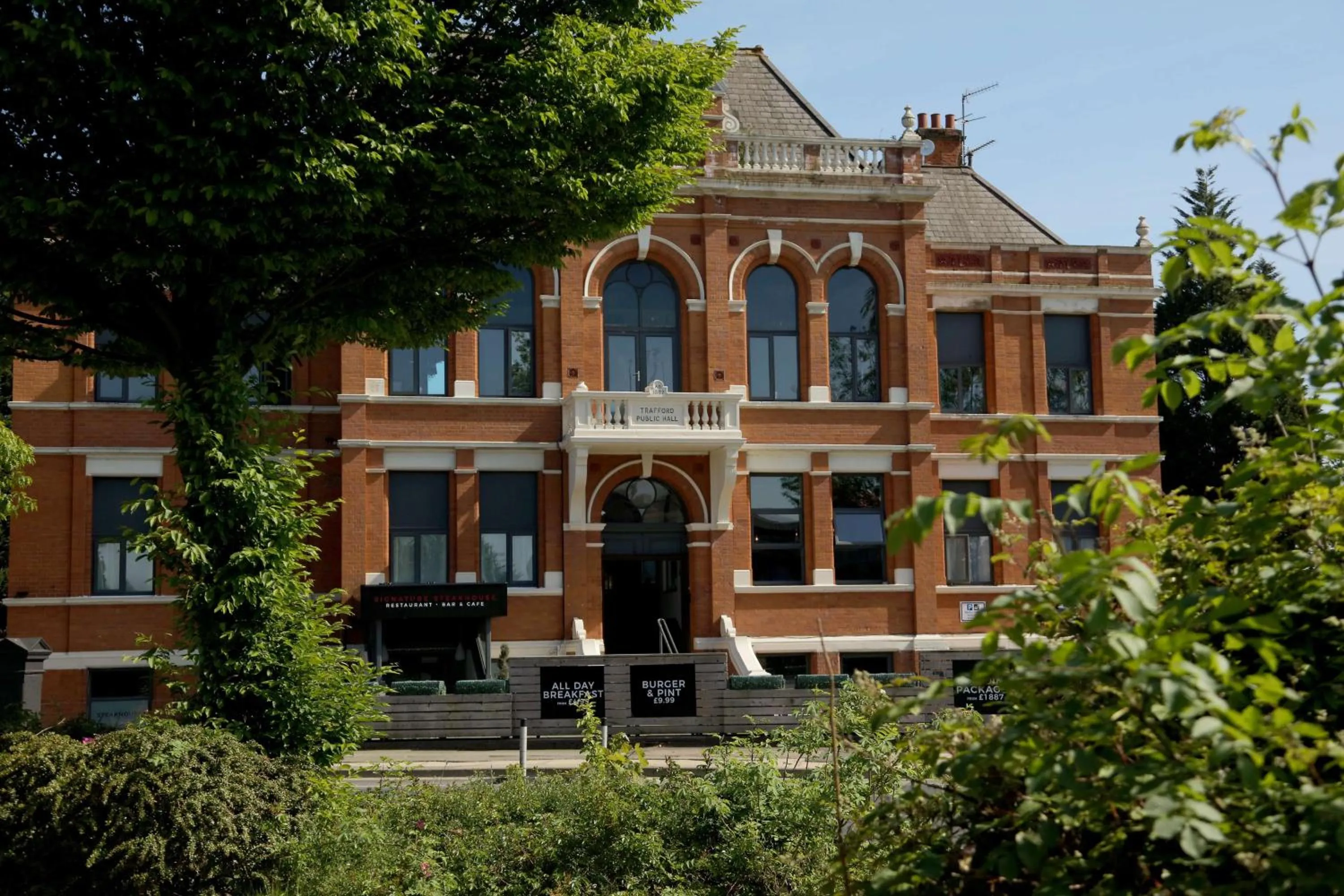 Property building in Trafford Hall Hotel Manchester, Trademark Collection by Wyndham