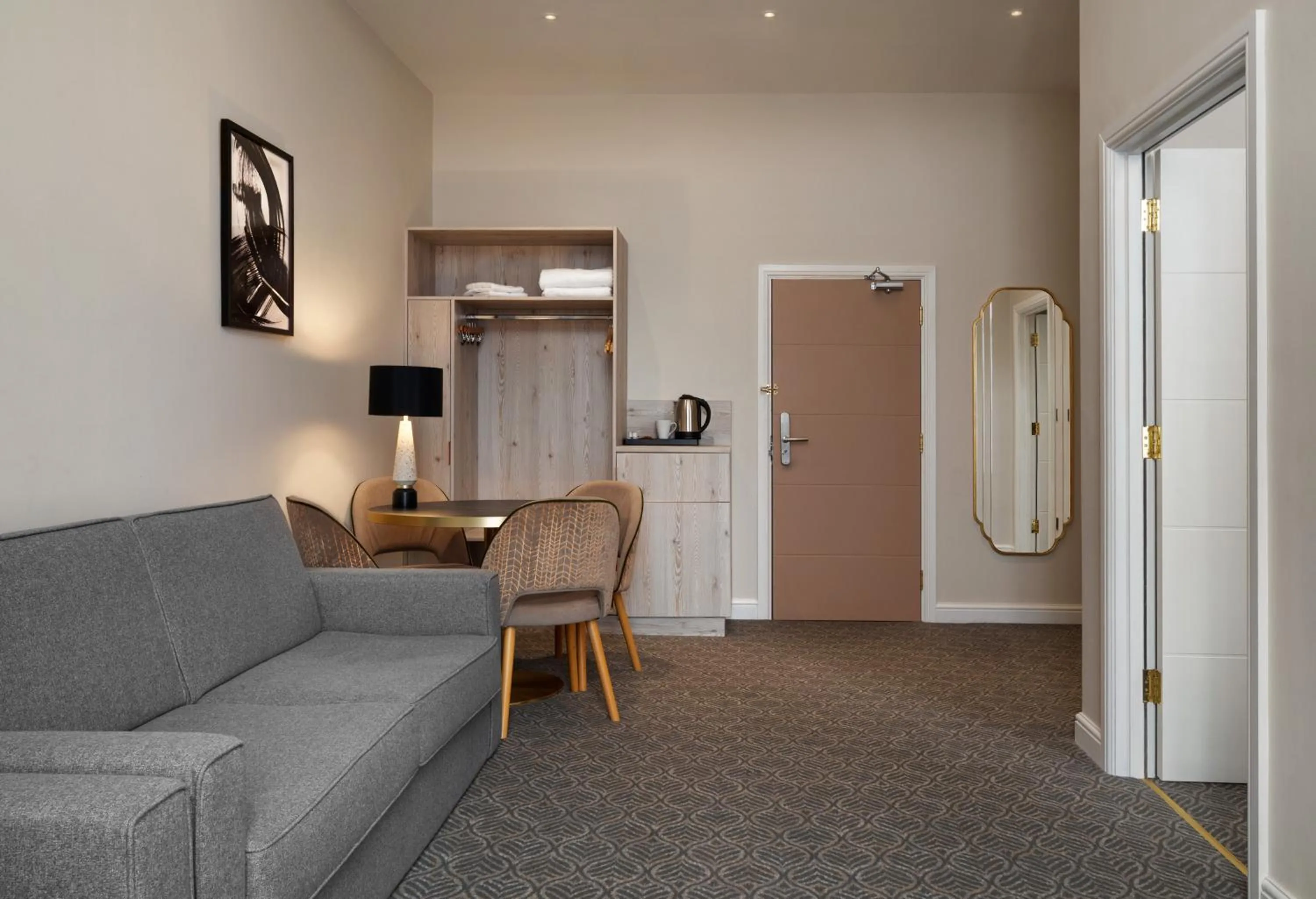 Living room in Trafford Hall Hotel Manchester, Trademark Collection by Wyndham