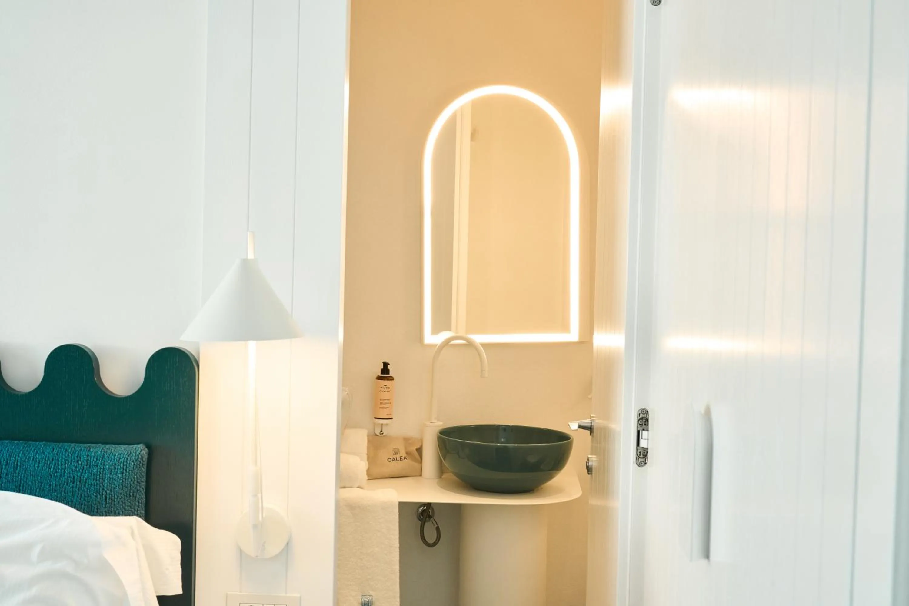 Bed in CALEA Boutique Hotel