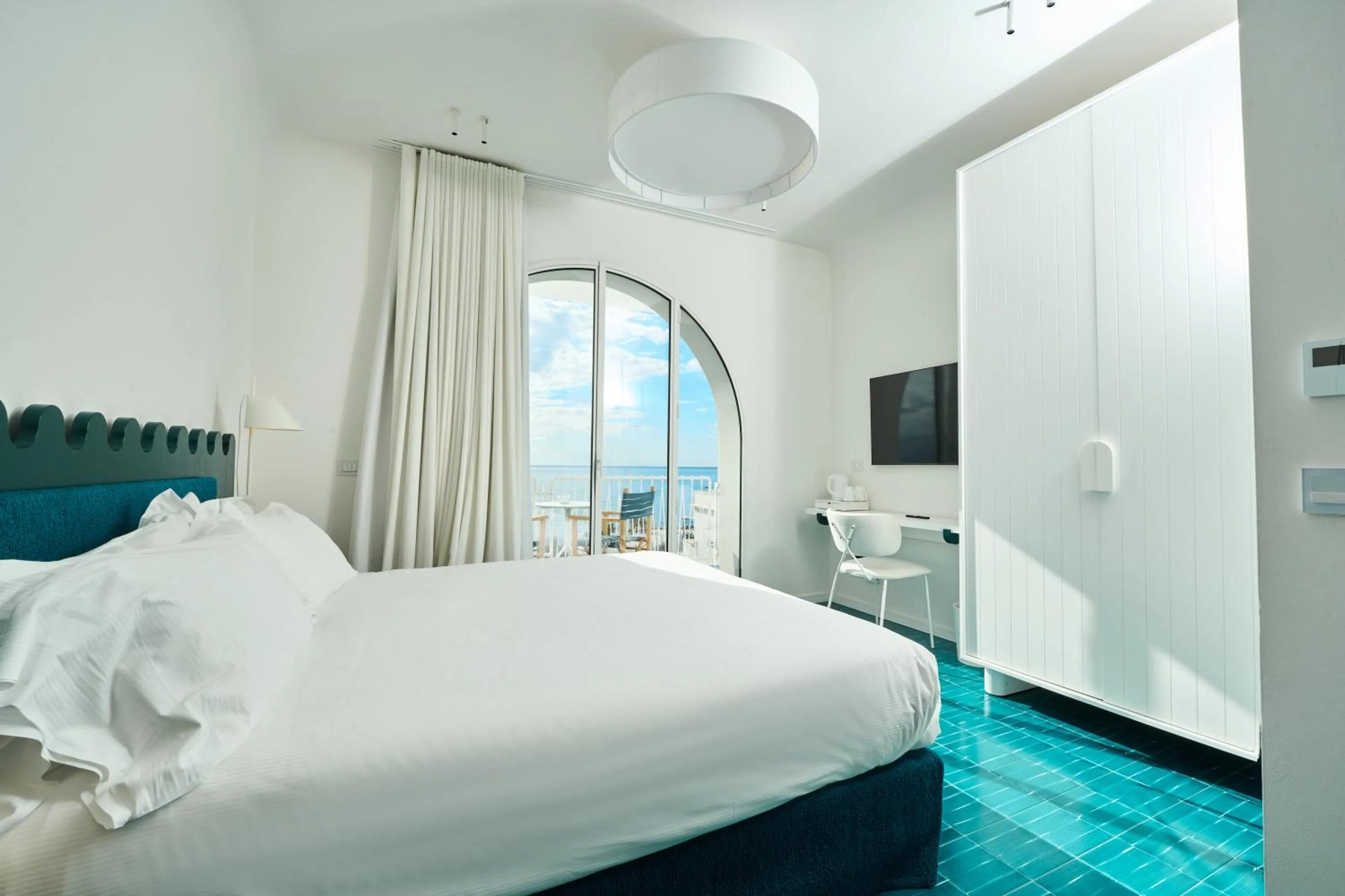 Bed in CALEA Boutique Hotel