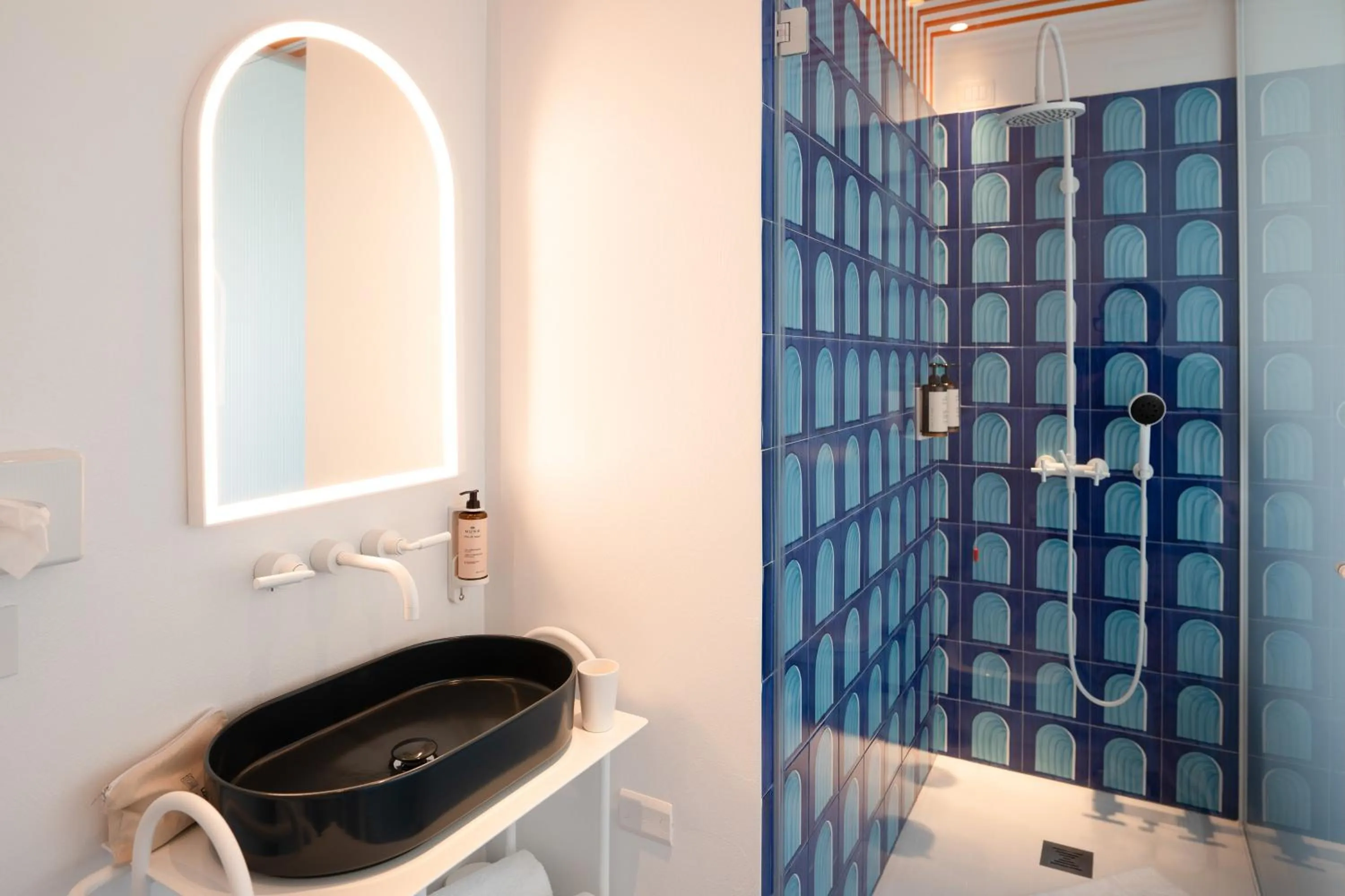 Shower in CALEA Boutique Hotel