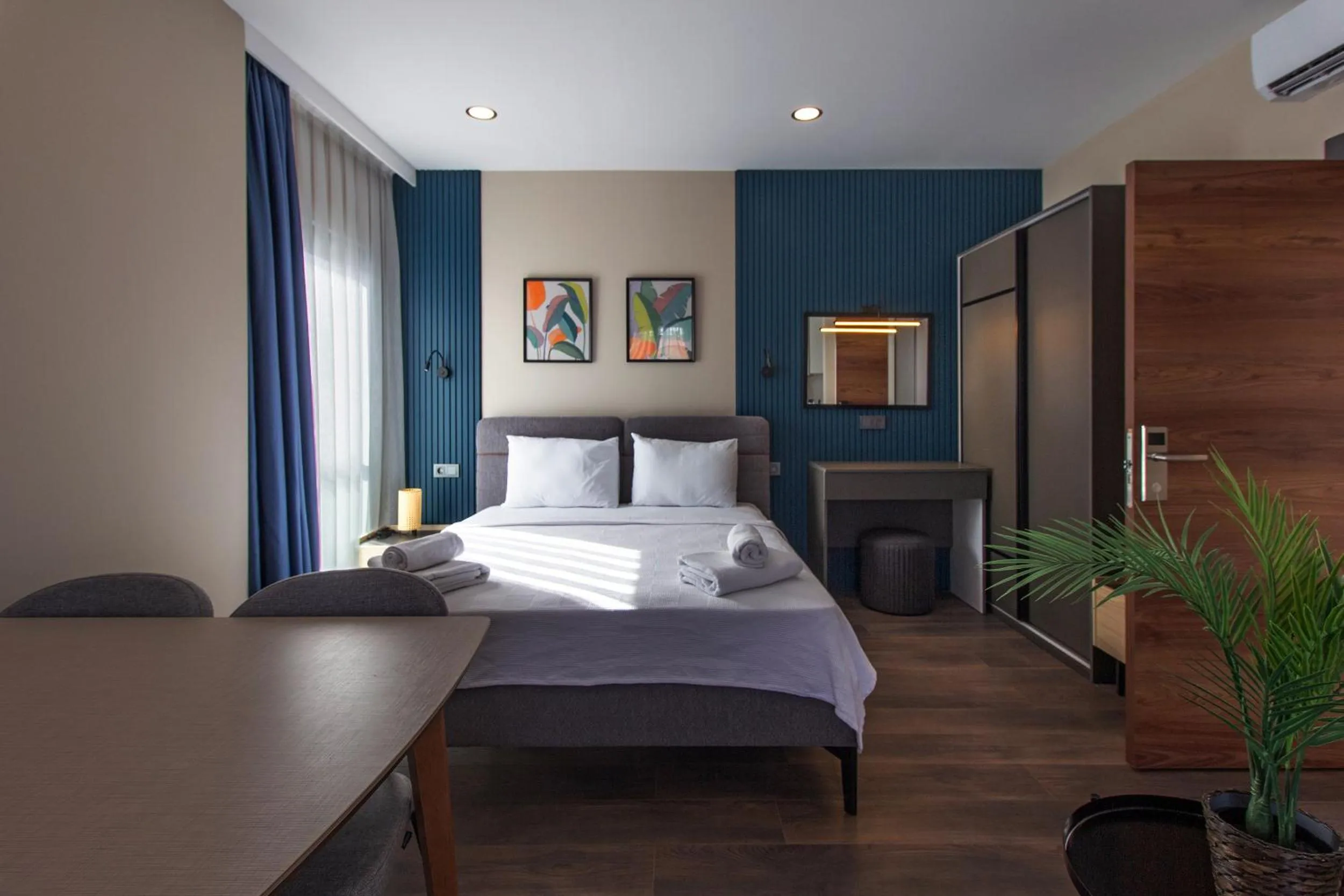 Photo of the whole room, Bed in Doqu Suites Hotel