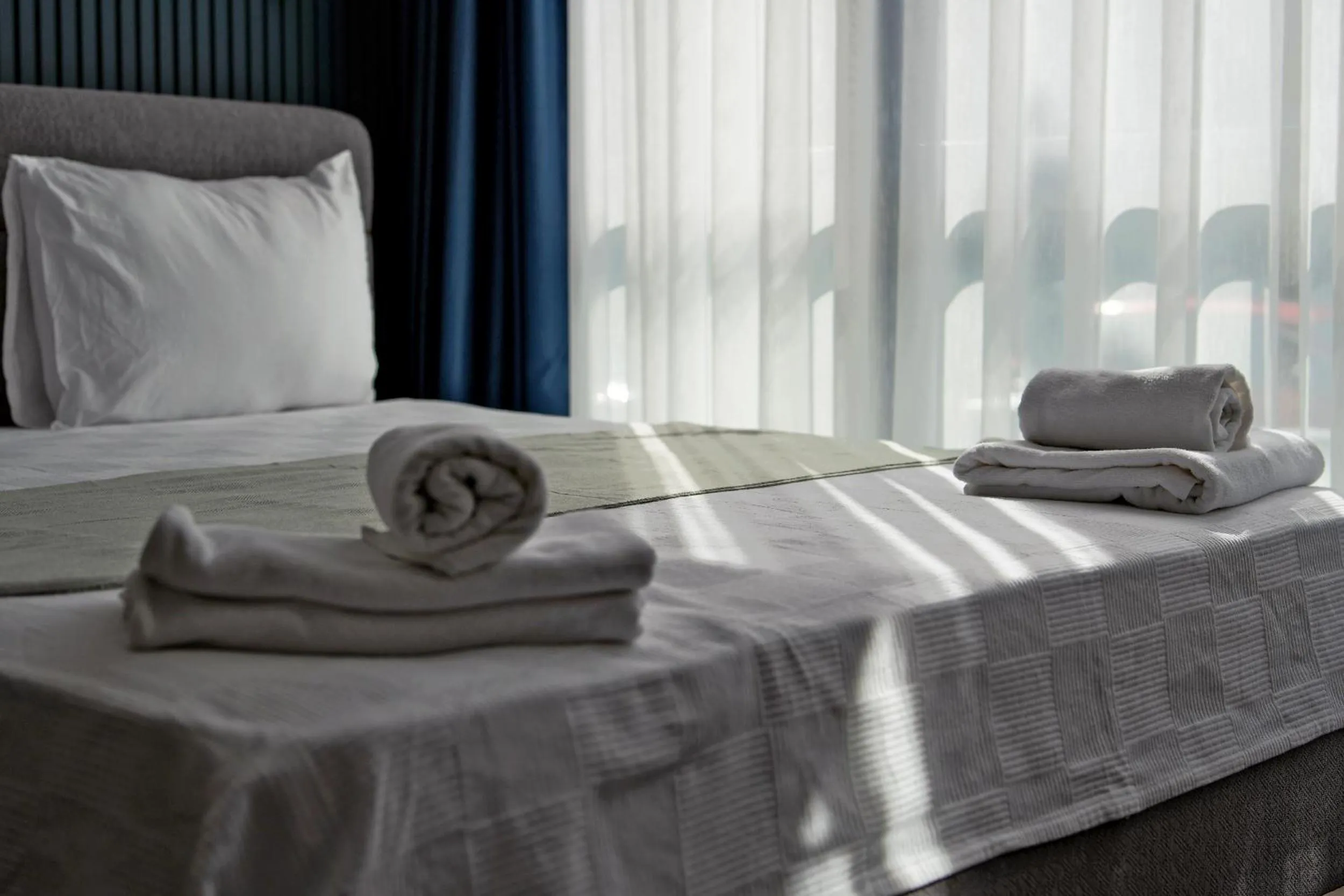 Bed in Doqu Suites Hotel