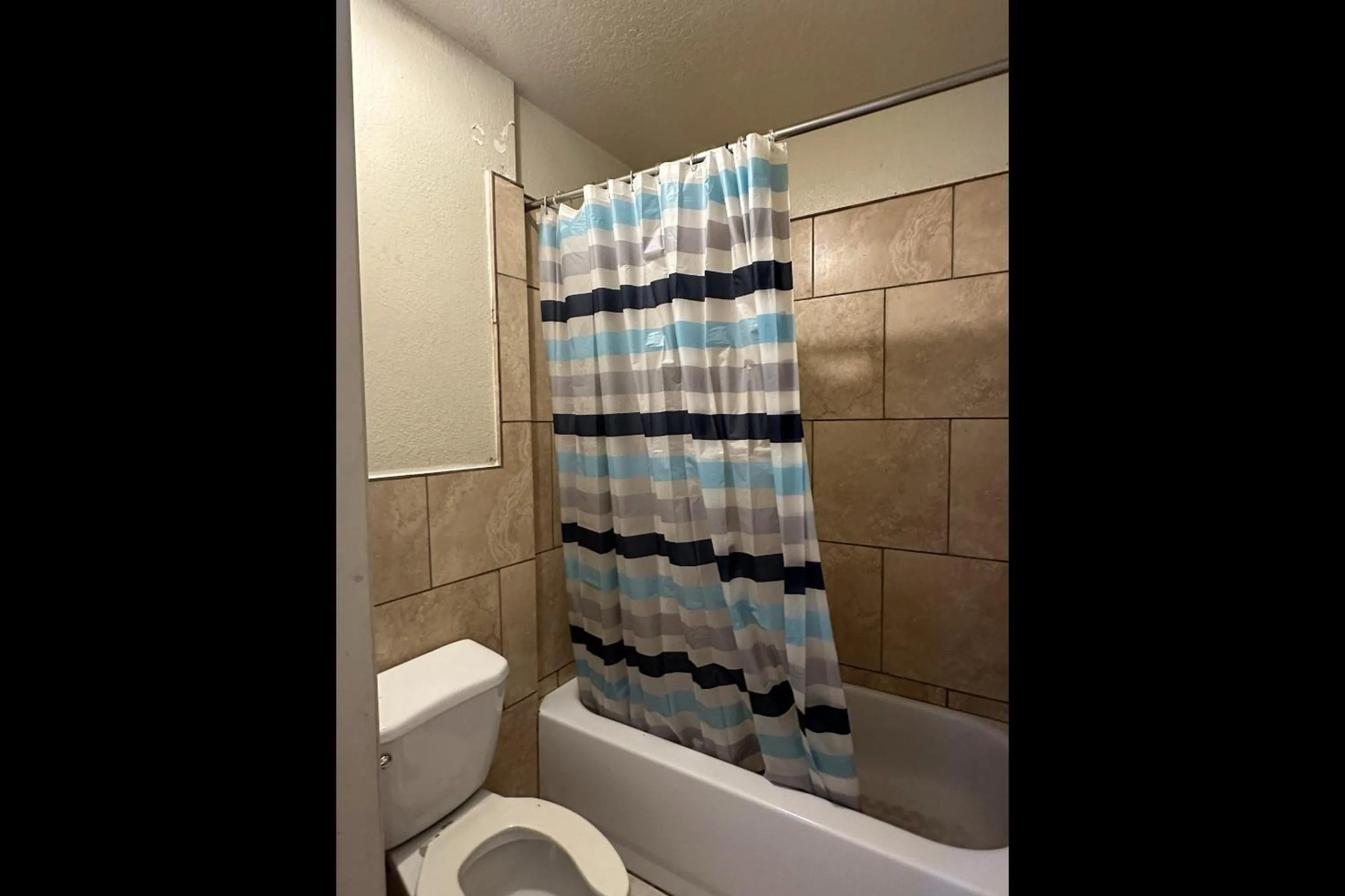 Bathroom in Travel Inn By OYO La Marque Texas City I-45