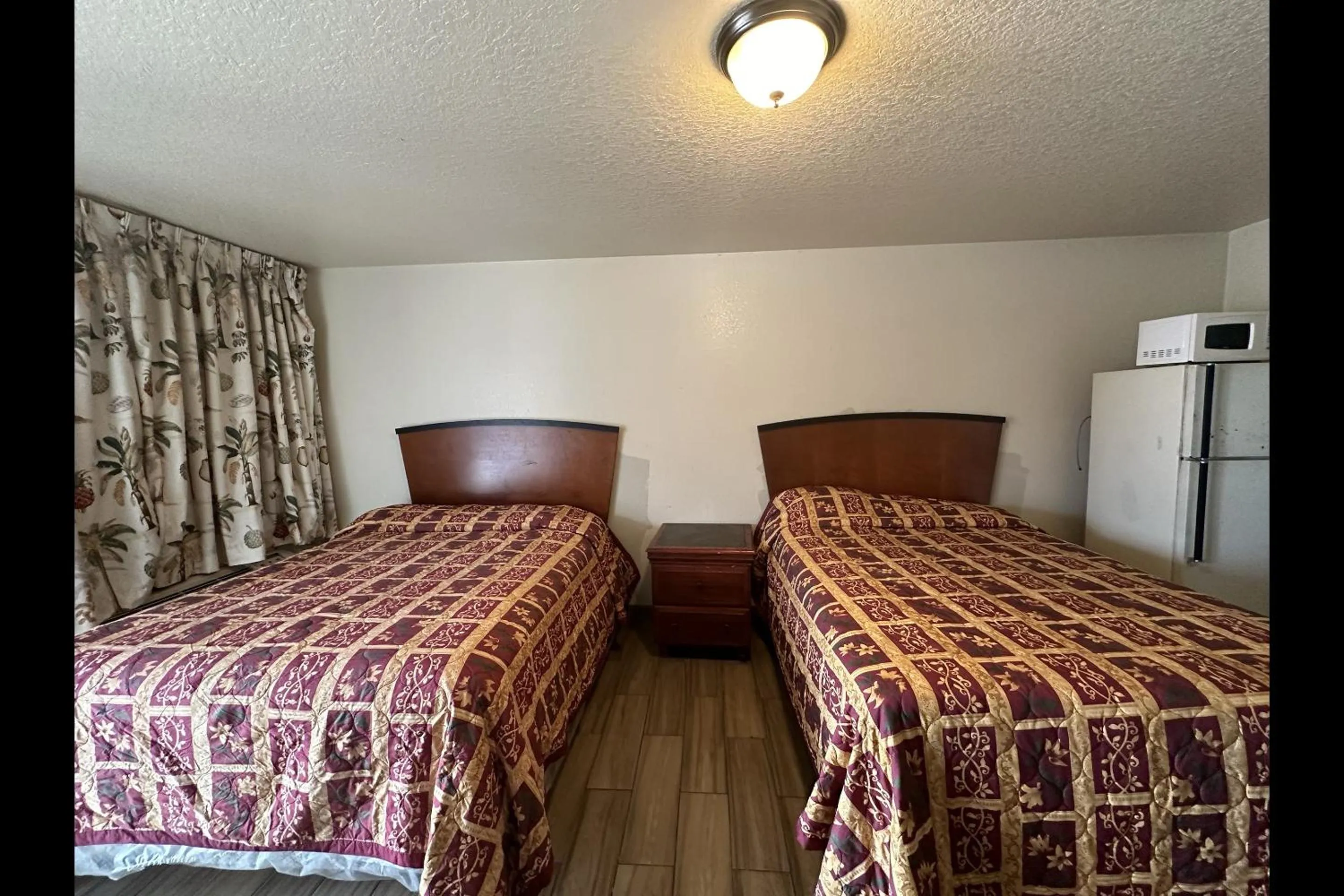 Bedroom in Travel Inn By OYO La Marque Texas City I-45