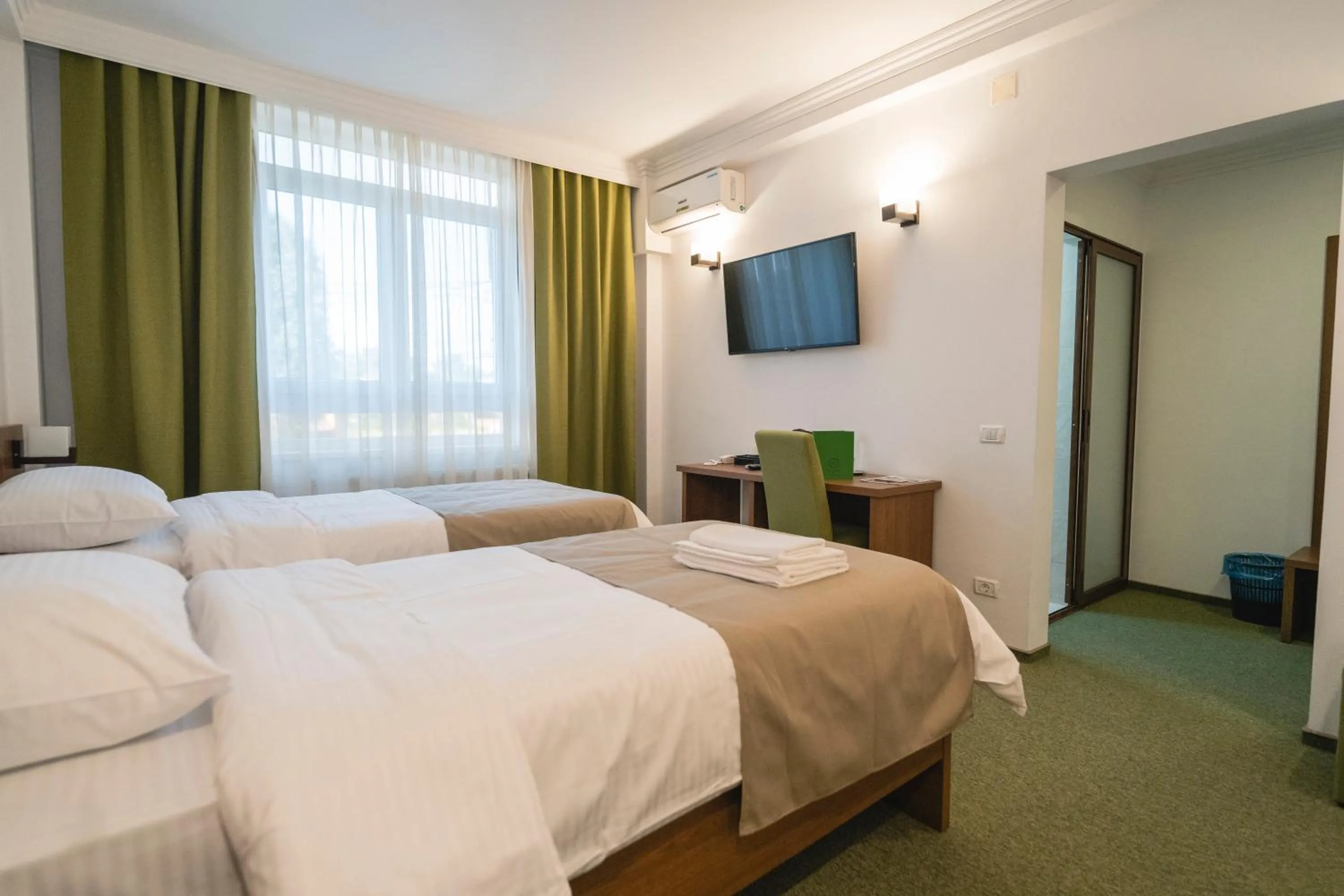 Bed in Hotel Comat Deva