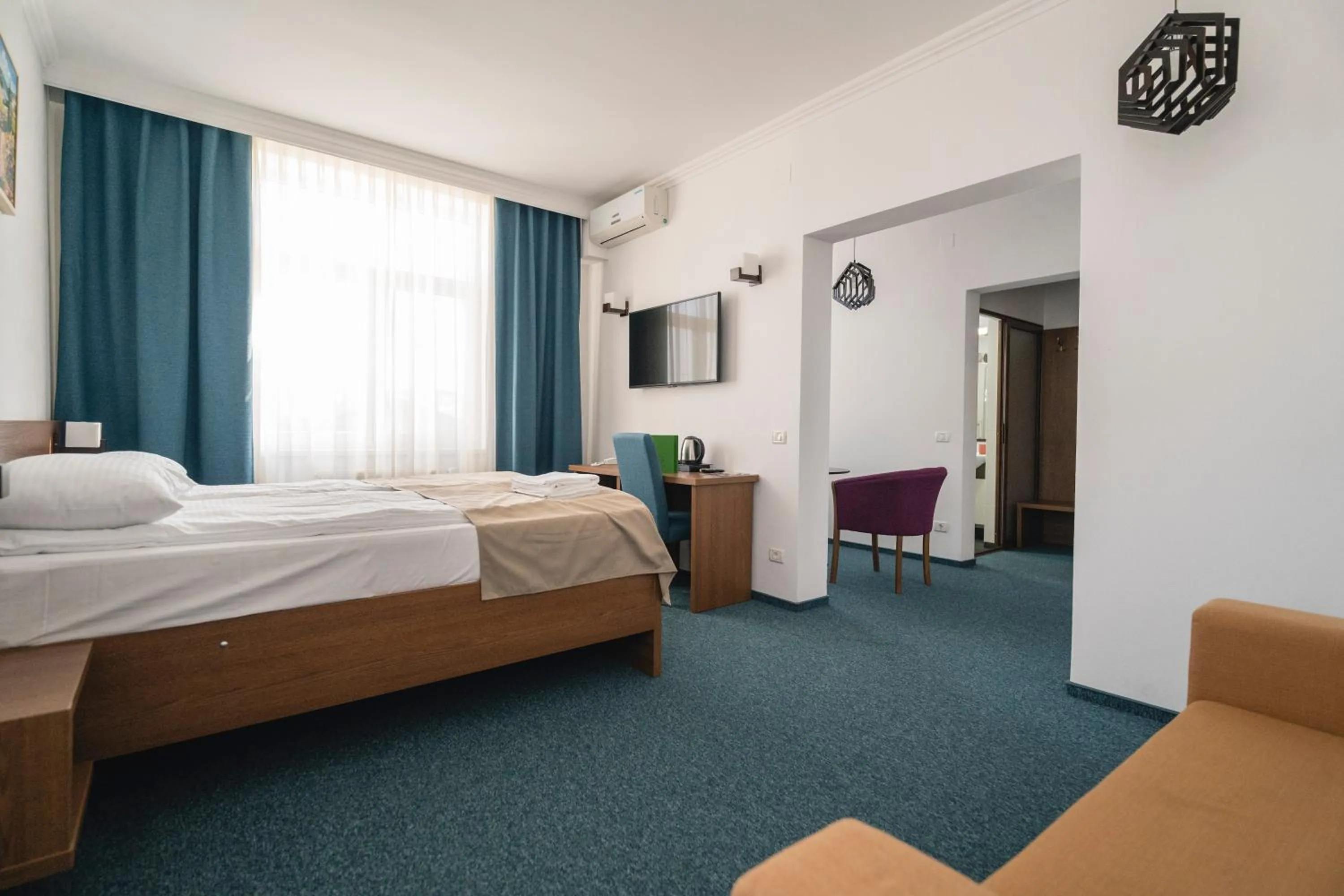 Bed in Hotel Comat Deva