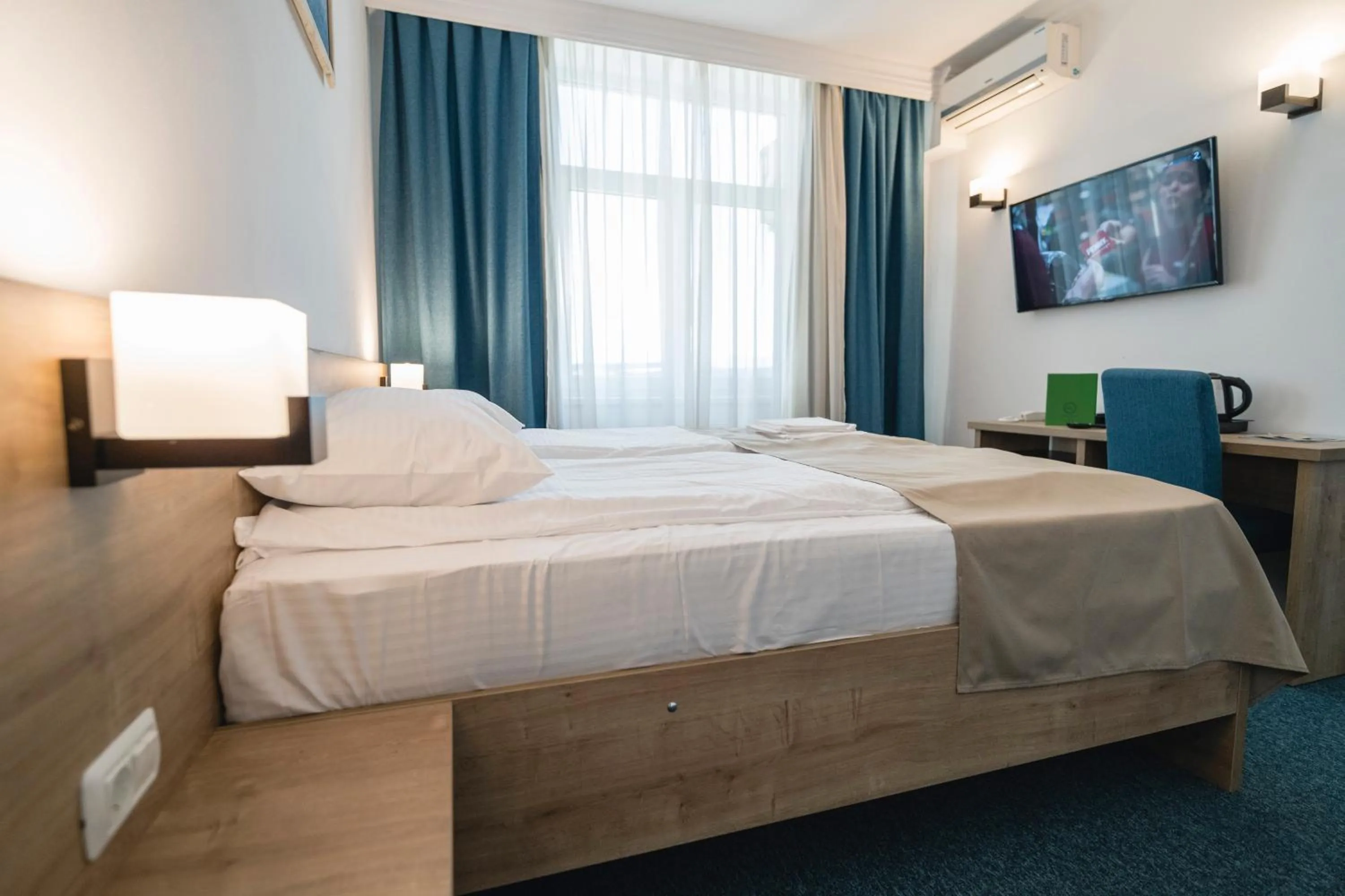 Bed in Hotel Comat Deva