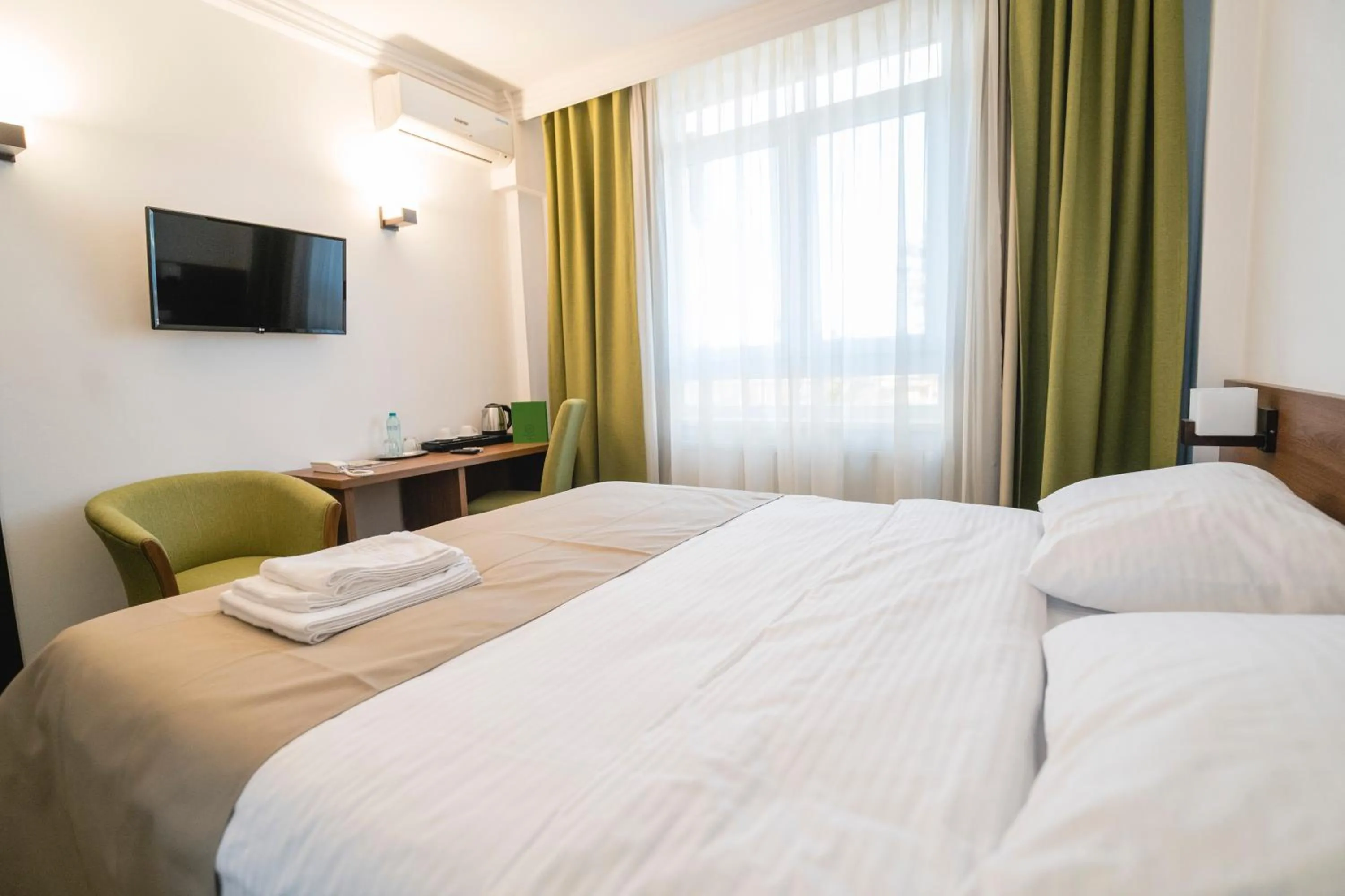 Bed in Hotel Comat Deva