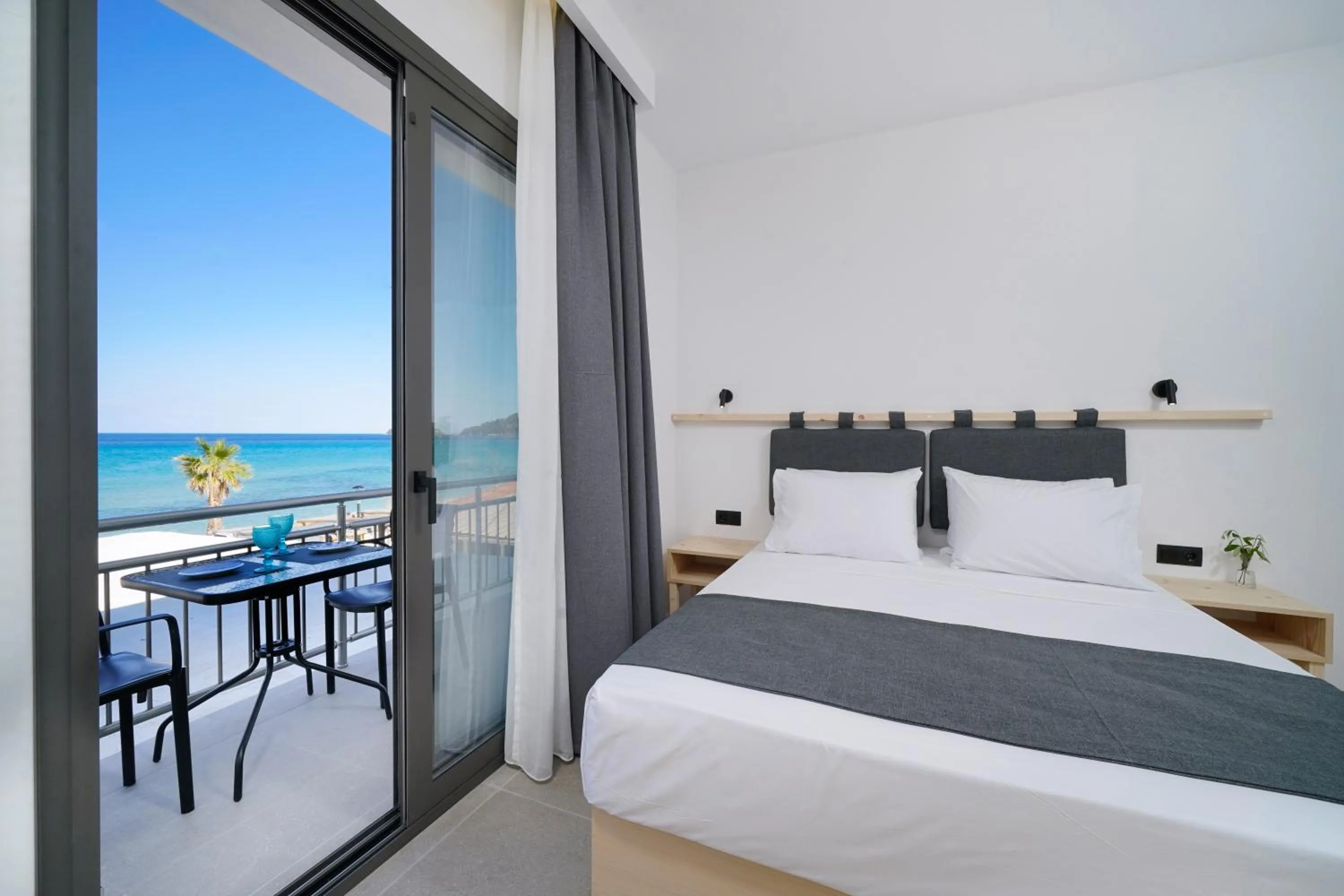 Bed in Emerial Deluxe Seaside Rooms