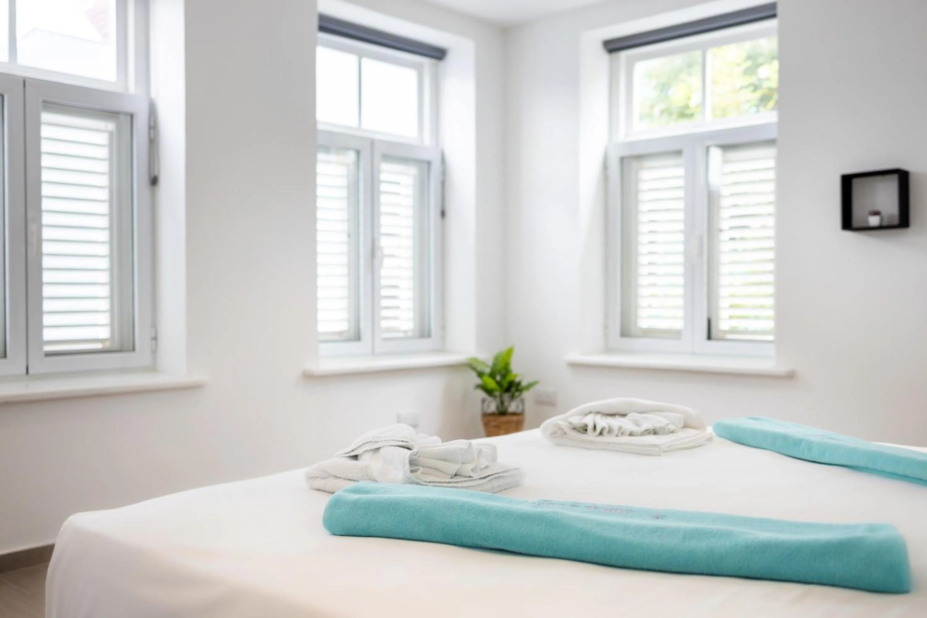 Bed in Willemstad Historic City Suites