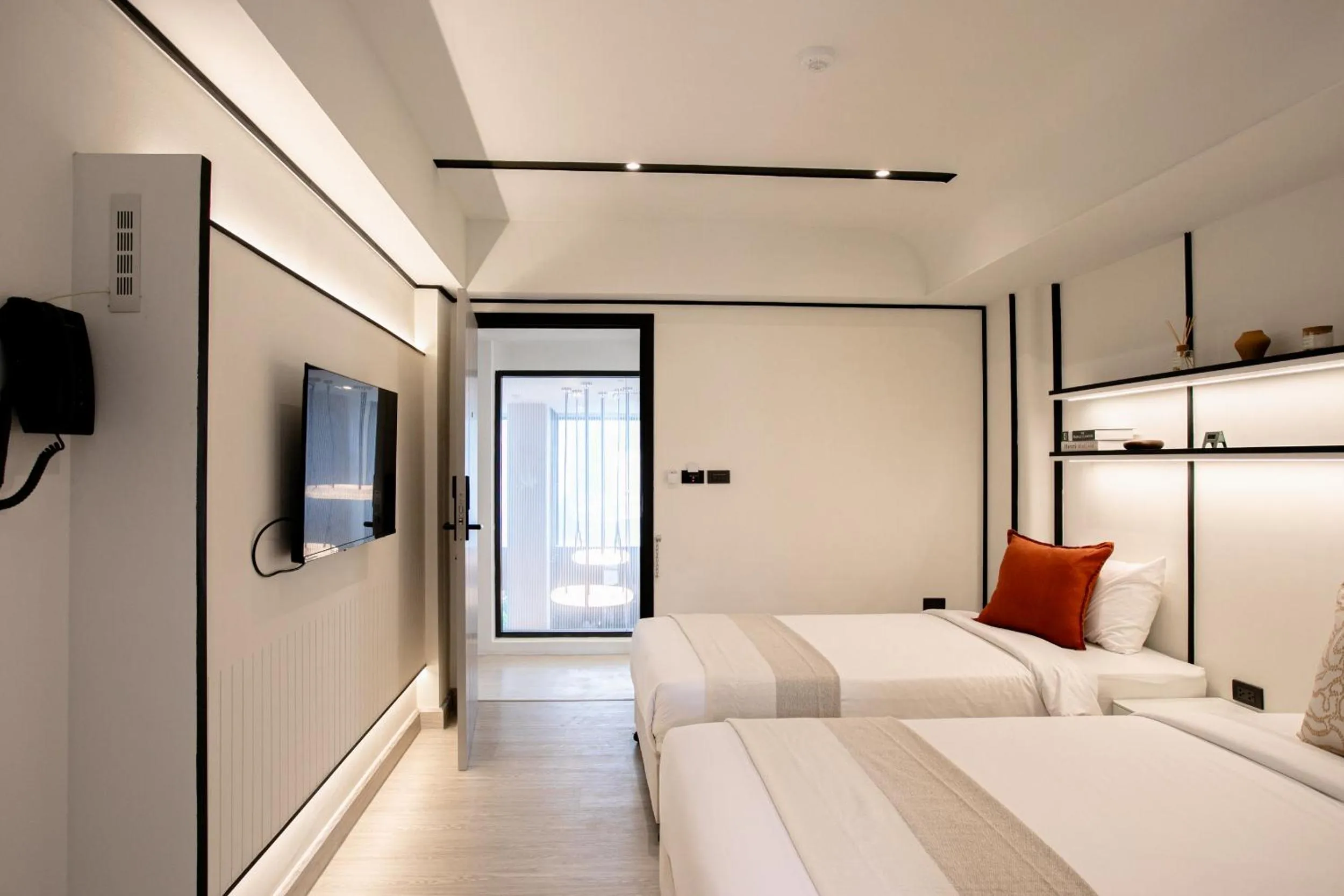 Bed in Pillow B Hotel