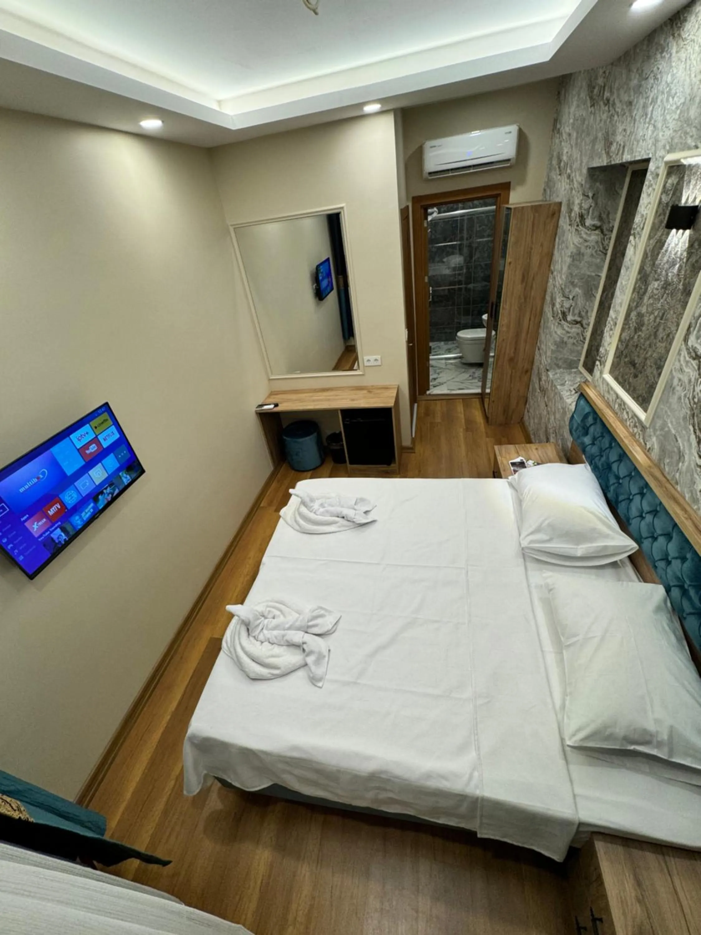 Bed in Riverside Hotel