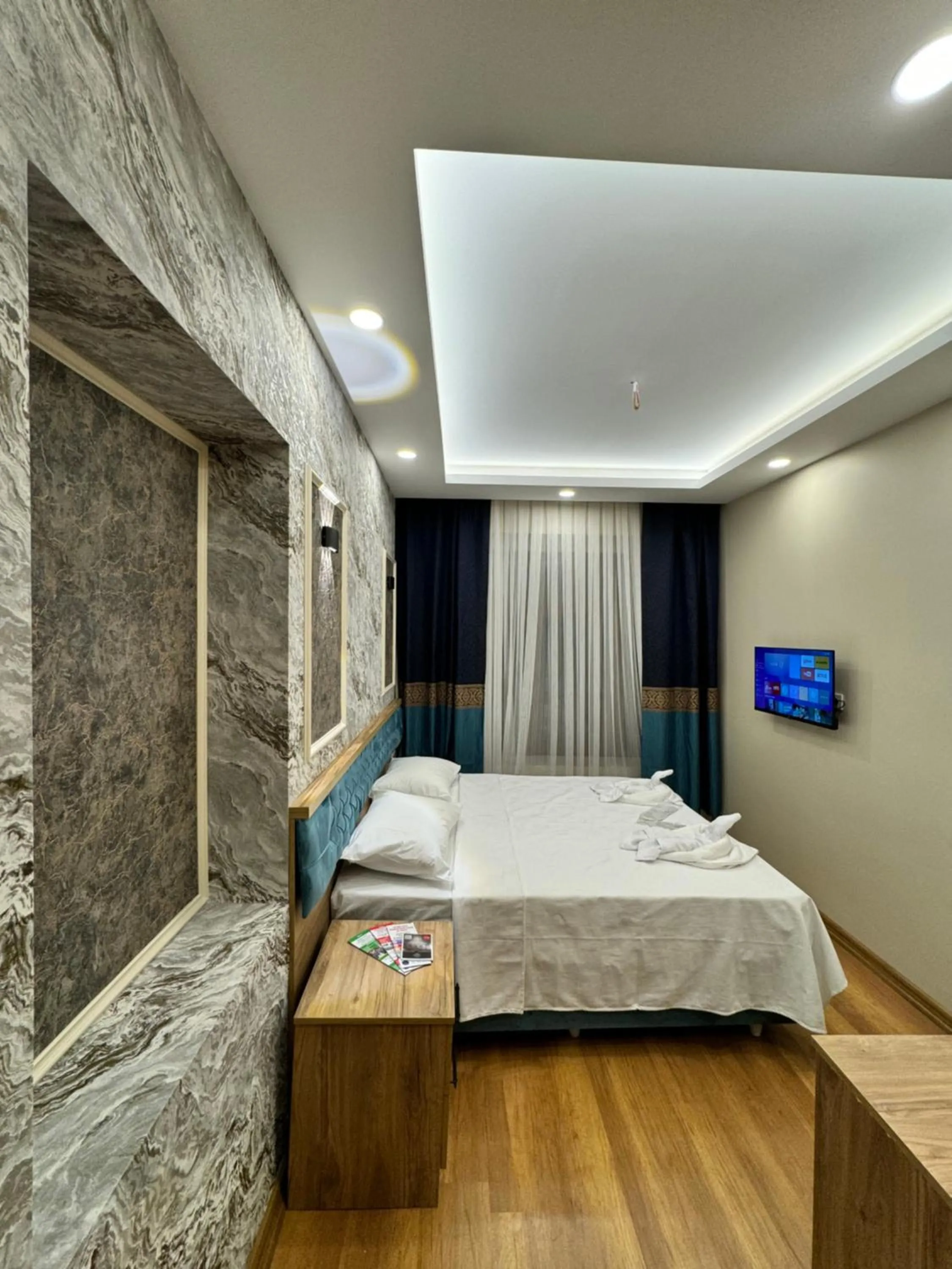 Bed in Riverside Hotel