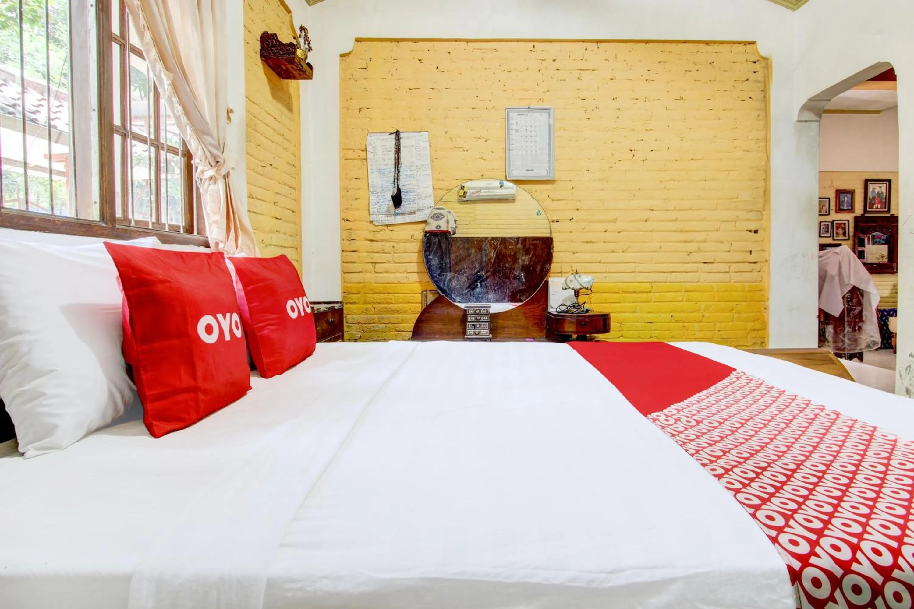 Bedroom, Bed in Hotel O Omah Citra Genia Homestay