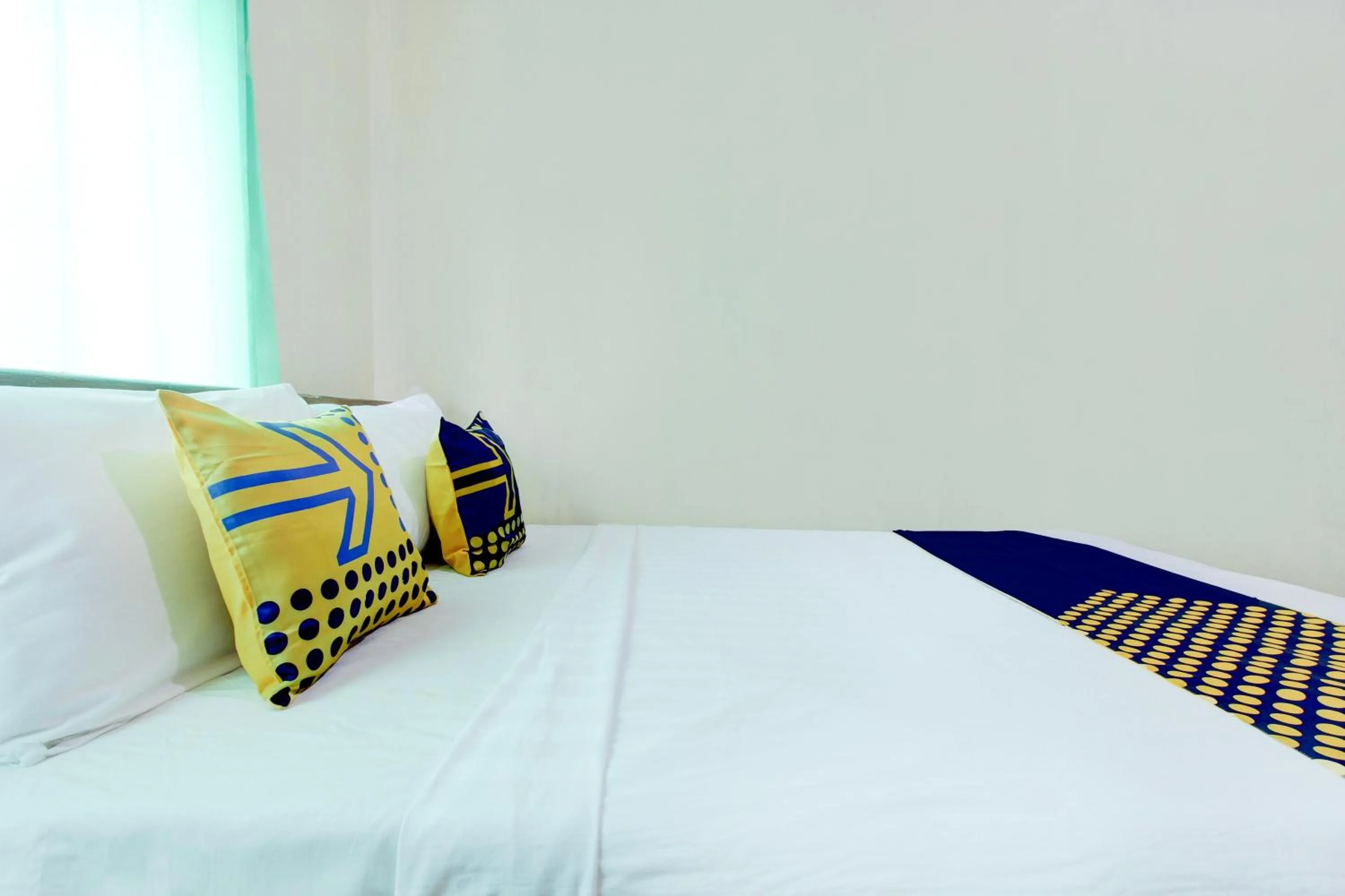 Bedroom in Hotel O Homestay Bintang Syariah