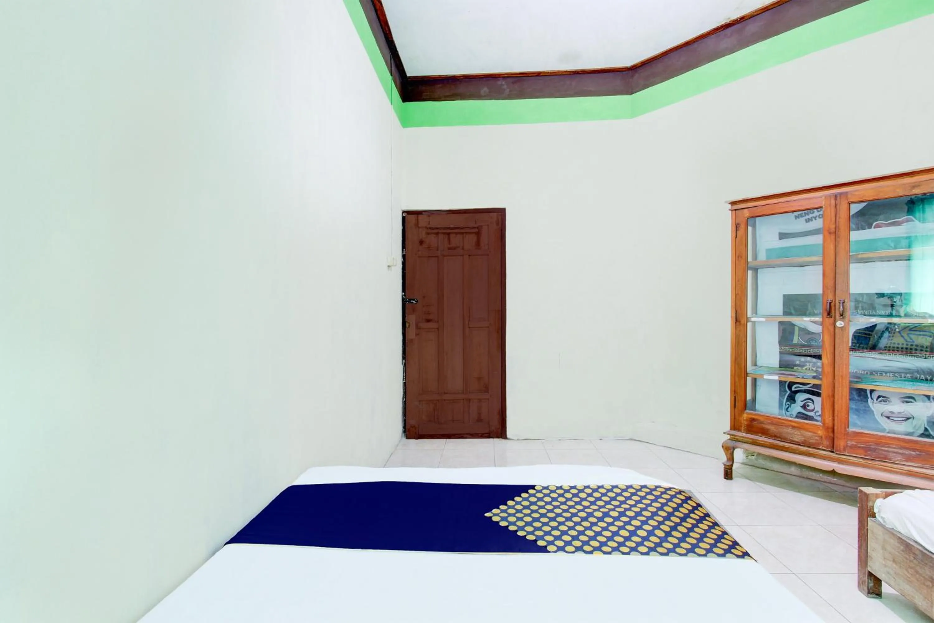 Bedroom in Hotel O Homestay Bintang Syariah